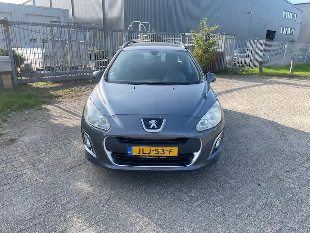 Peugeot 308 (2011) — foto 1