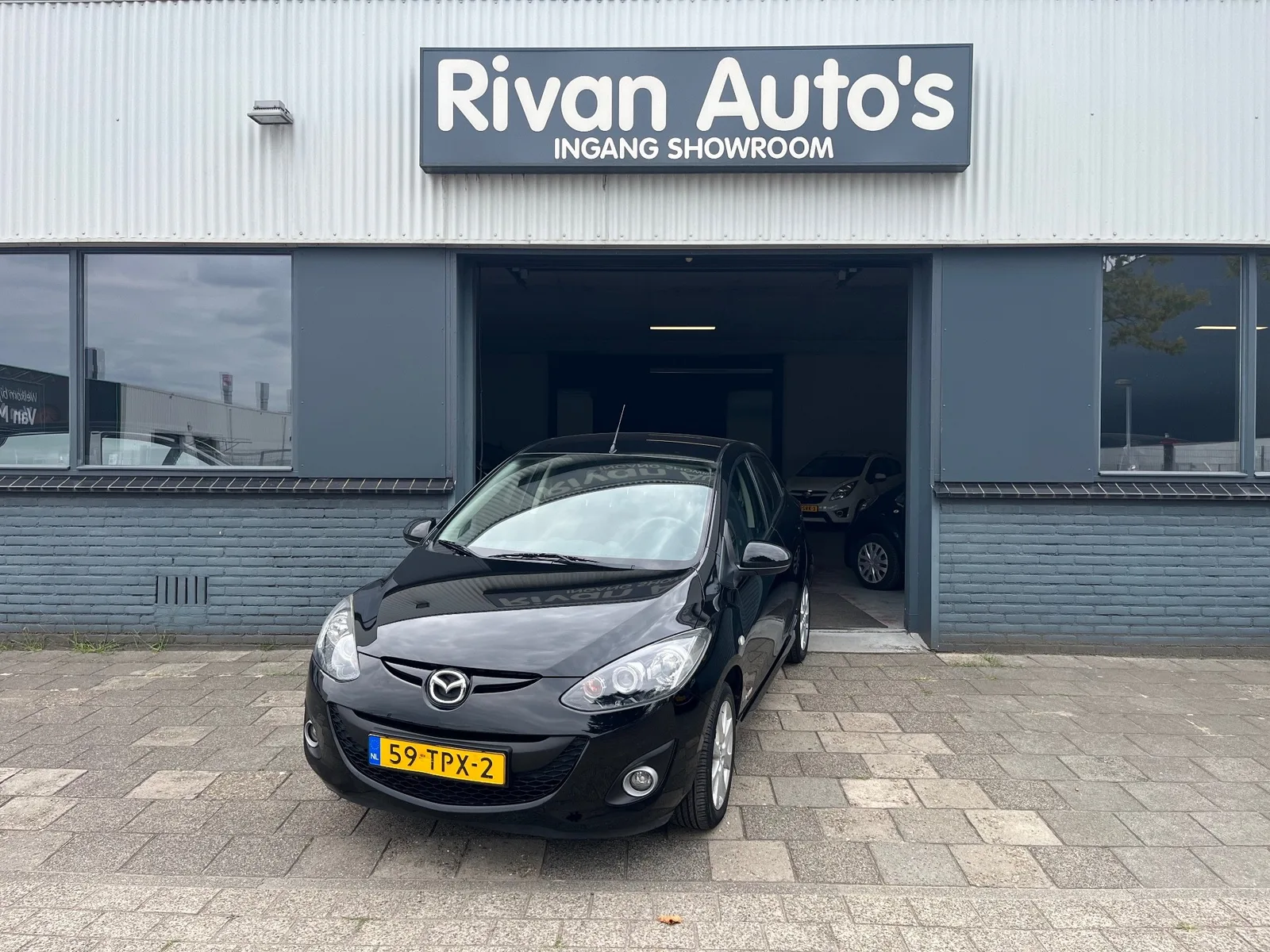 Mazda 2 (2012) — foto 1