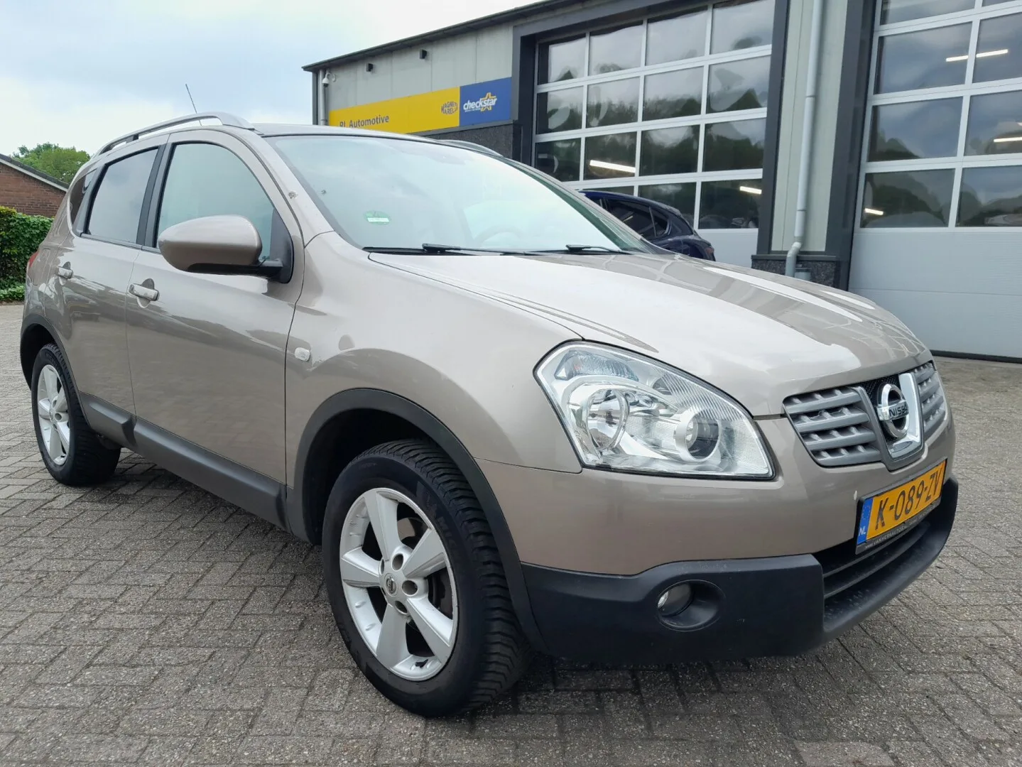 Nissan Qashqai (2009) — foto 1