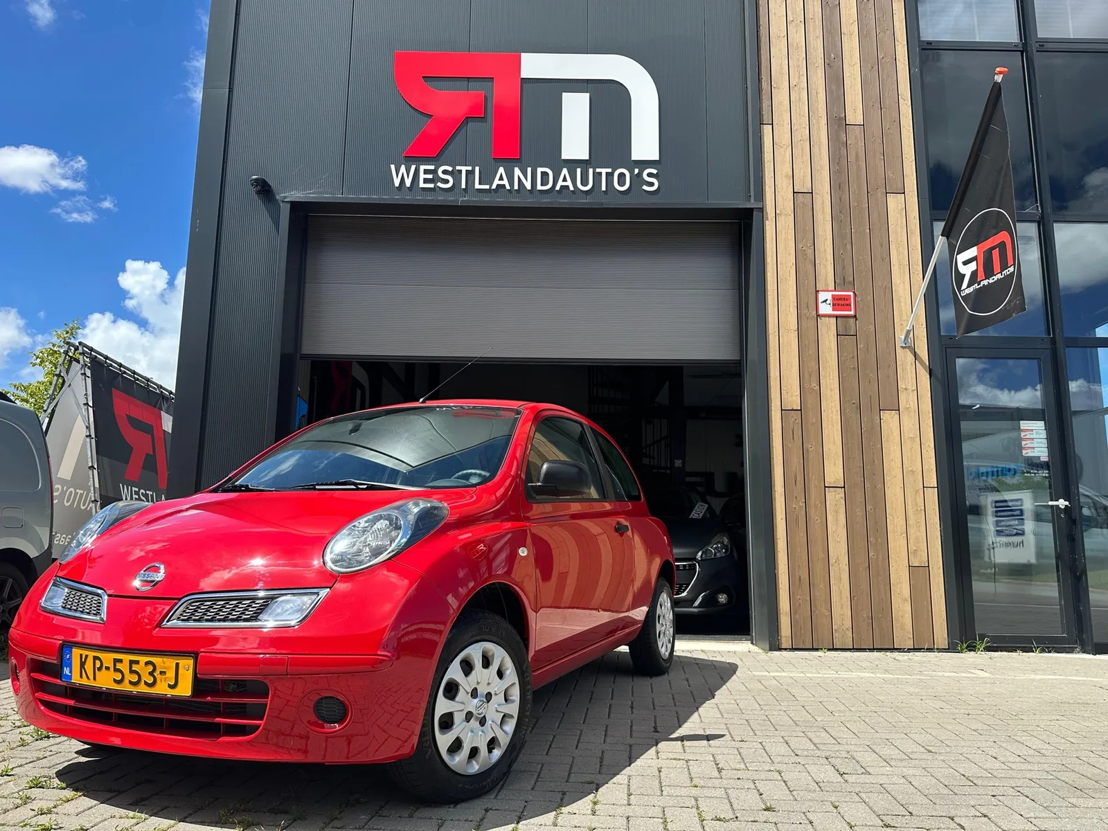 Nissan Micra (2010) — foto 1