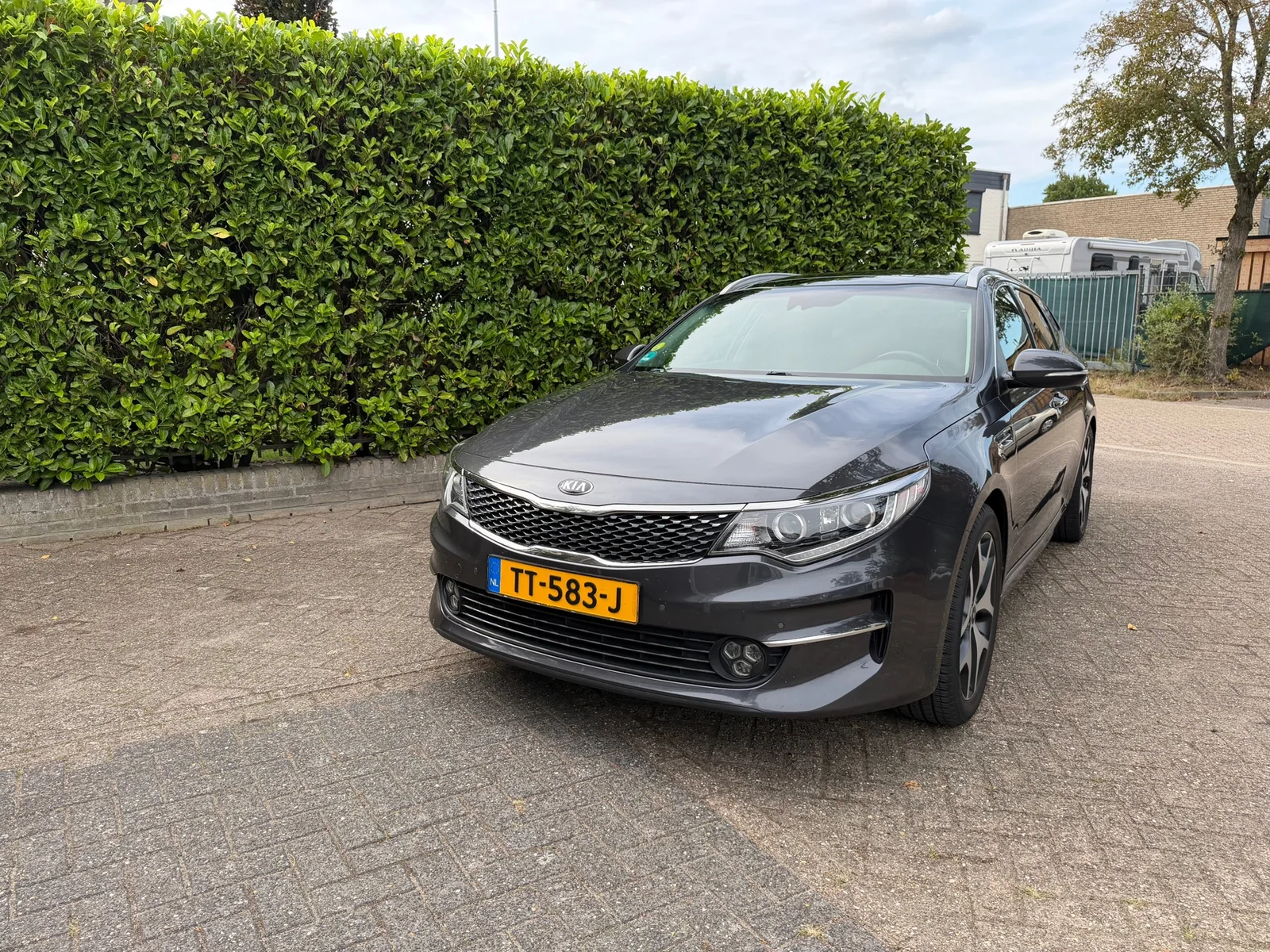 Kia Optima Sportswagon (2018) — foto 1