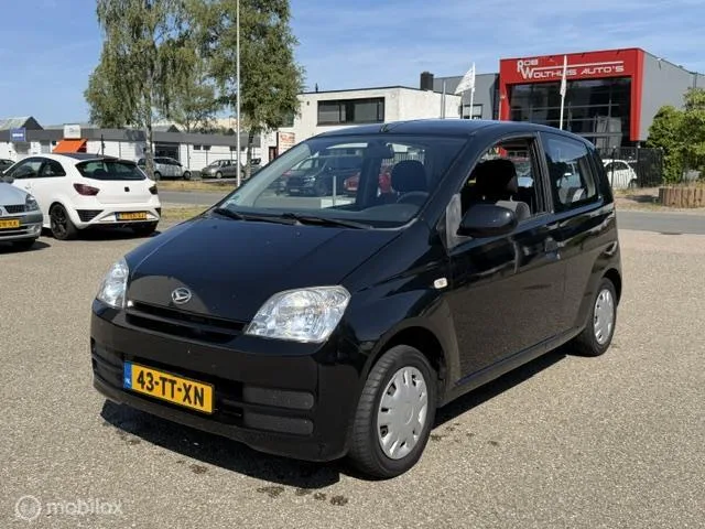 Daihatsu Cuore (2007) — foto 1