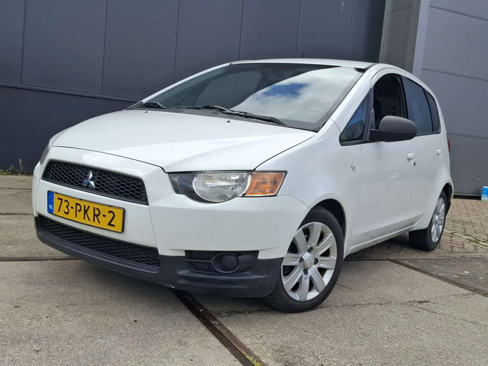 Mitsubishi Colt (2011) — foto 1