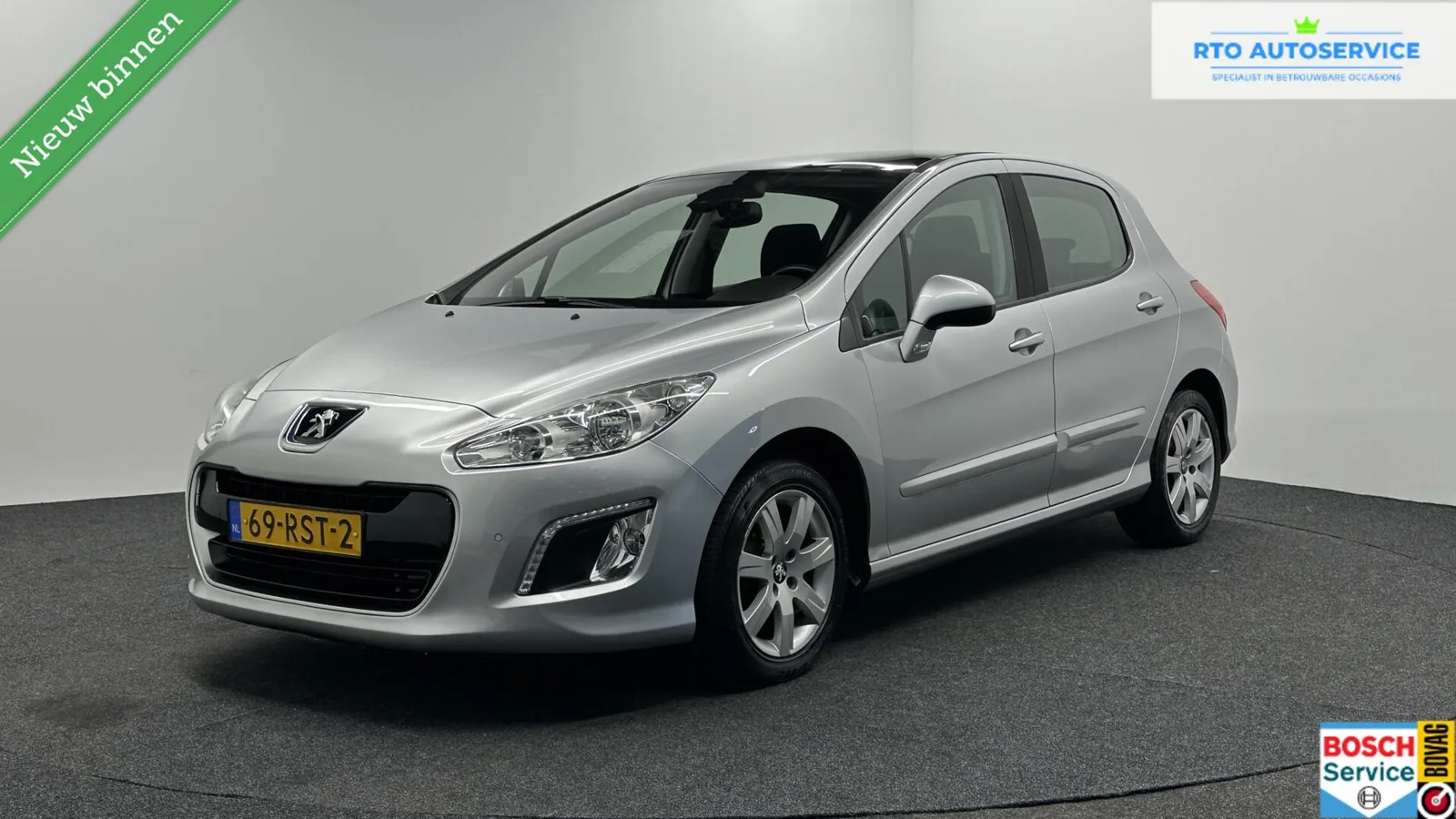 Peugeot 308 (2011) — foto 1