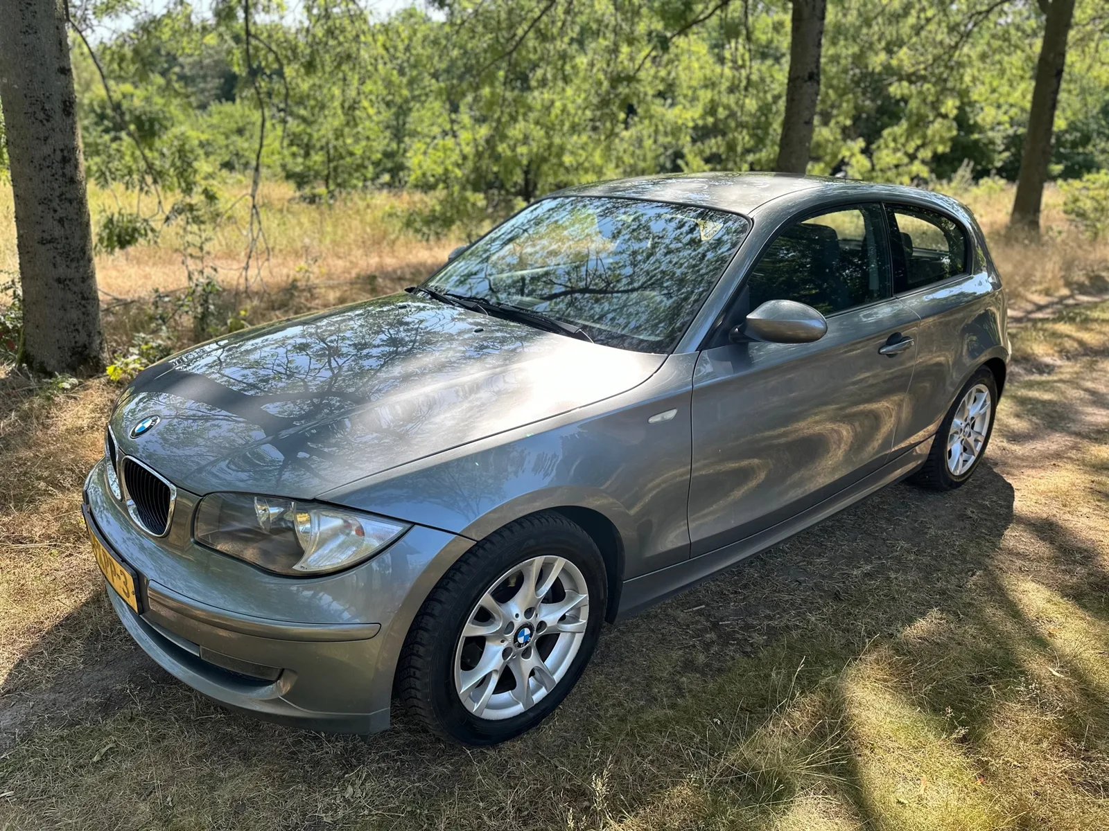 BMW 1-Serie (2010) — foto 1
