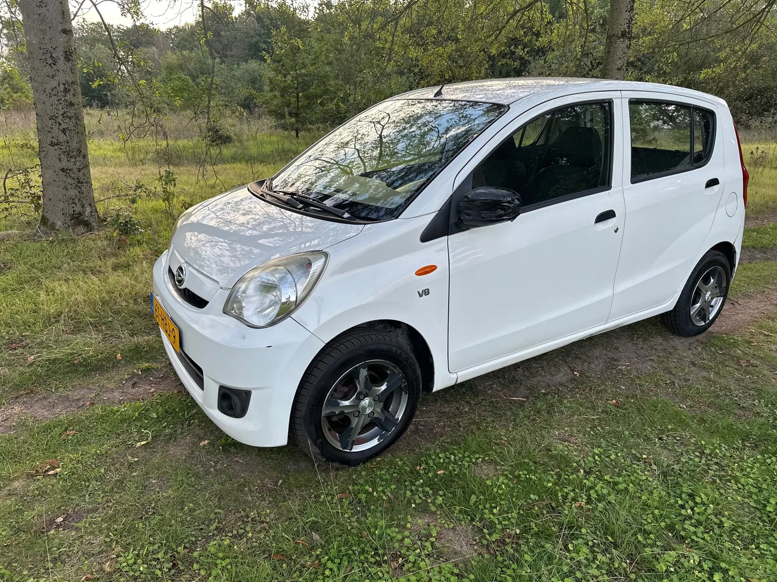 Daihatsu Cuore (2008) — foto 1