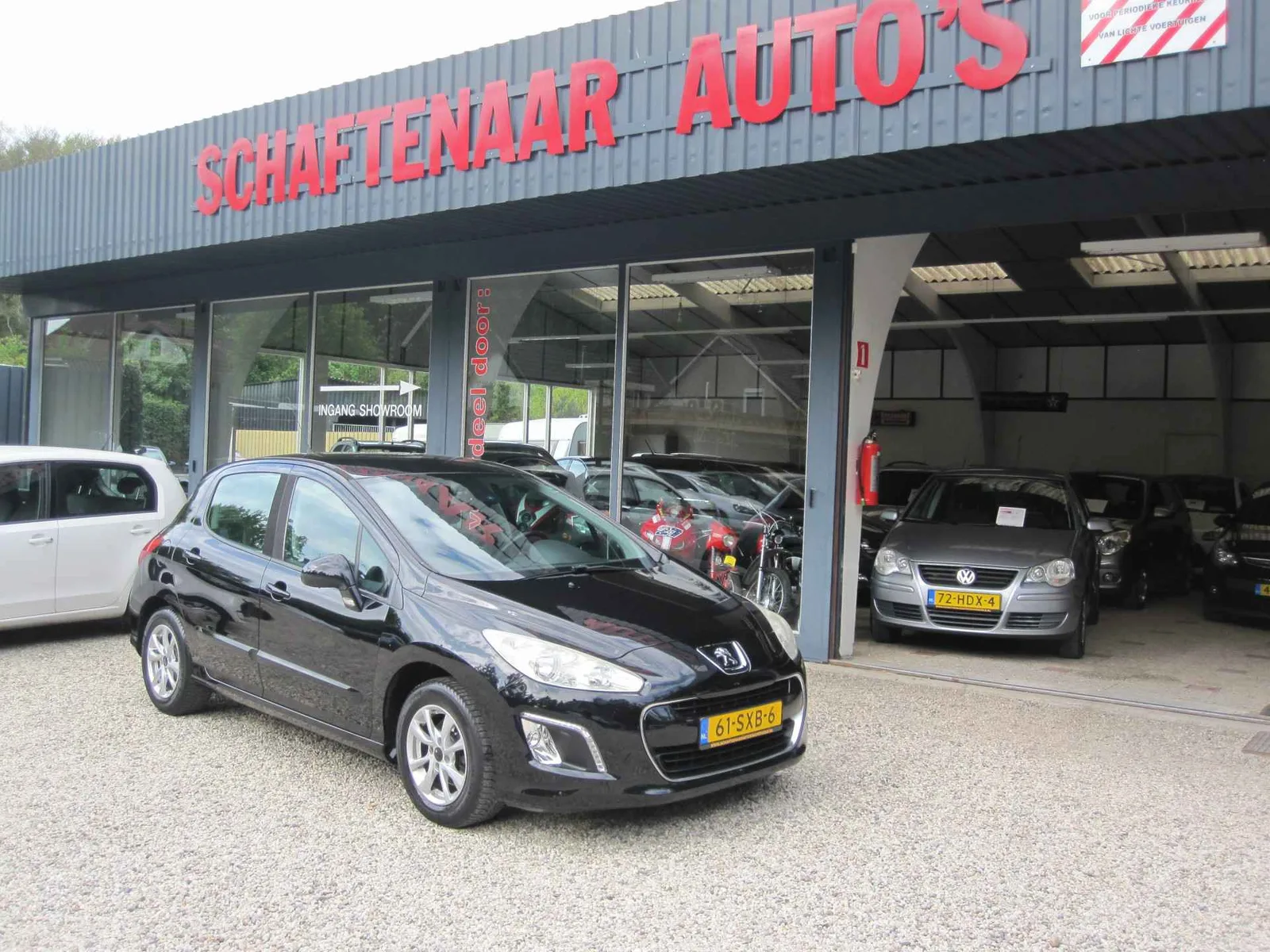 Peugeot 308 (2011) — foto 1
