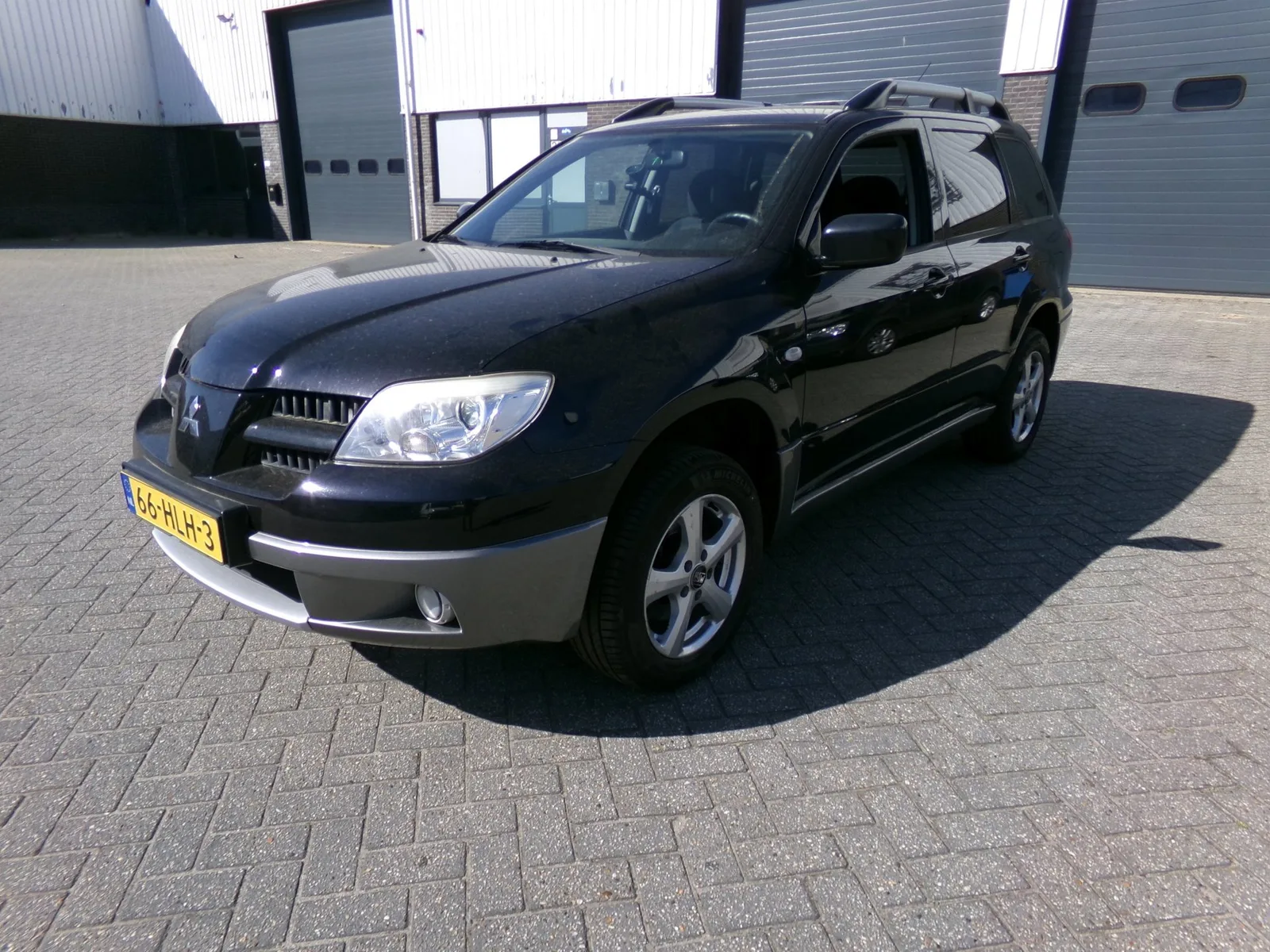 Mitsubishi Outlander (2009) — foto 1
