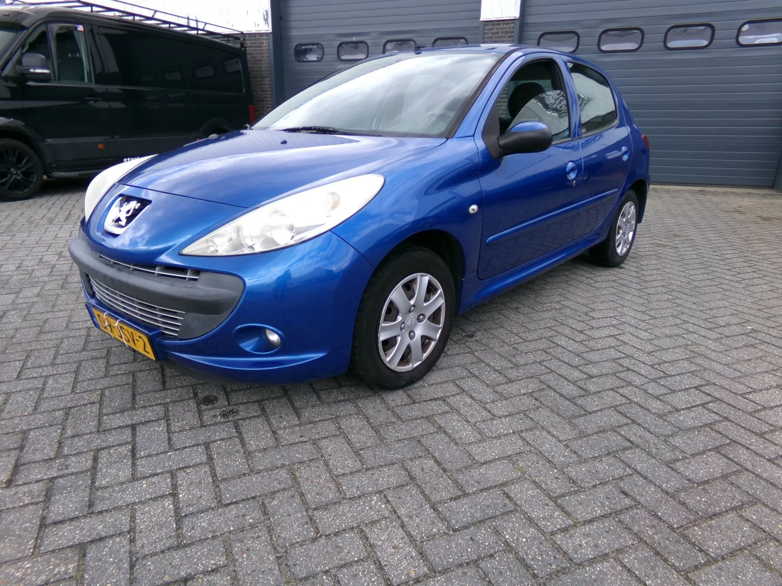 Peugeot 206+ (2009) — foto 1