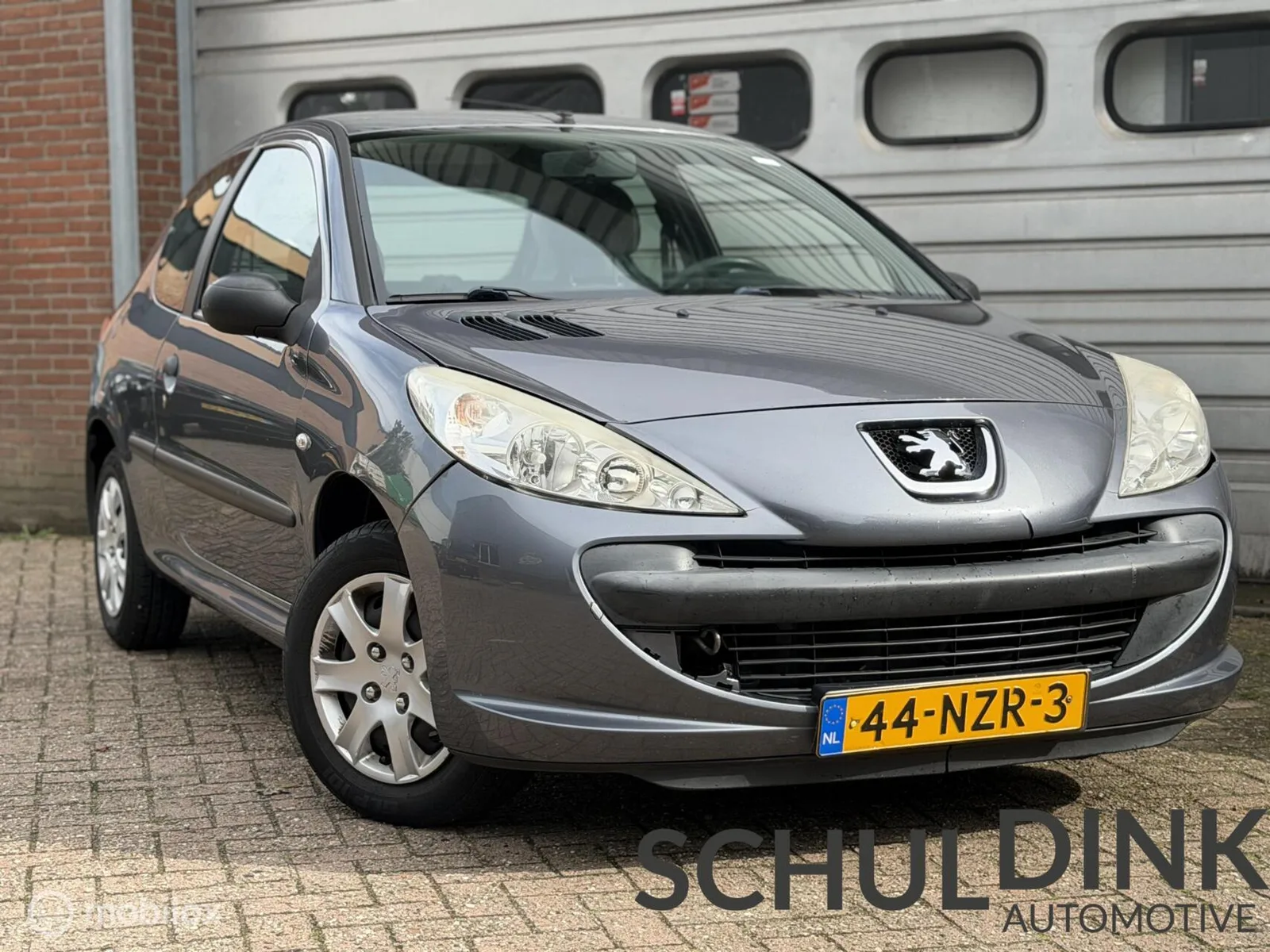 Peugeot 206 (2011) — foto 1