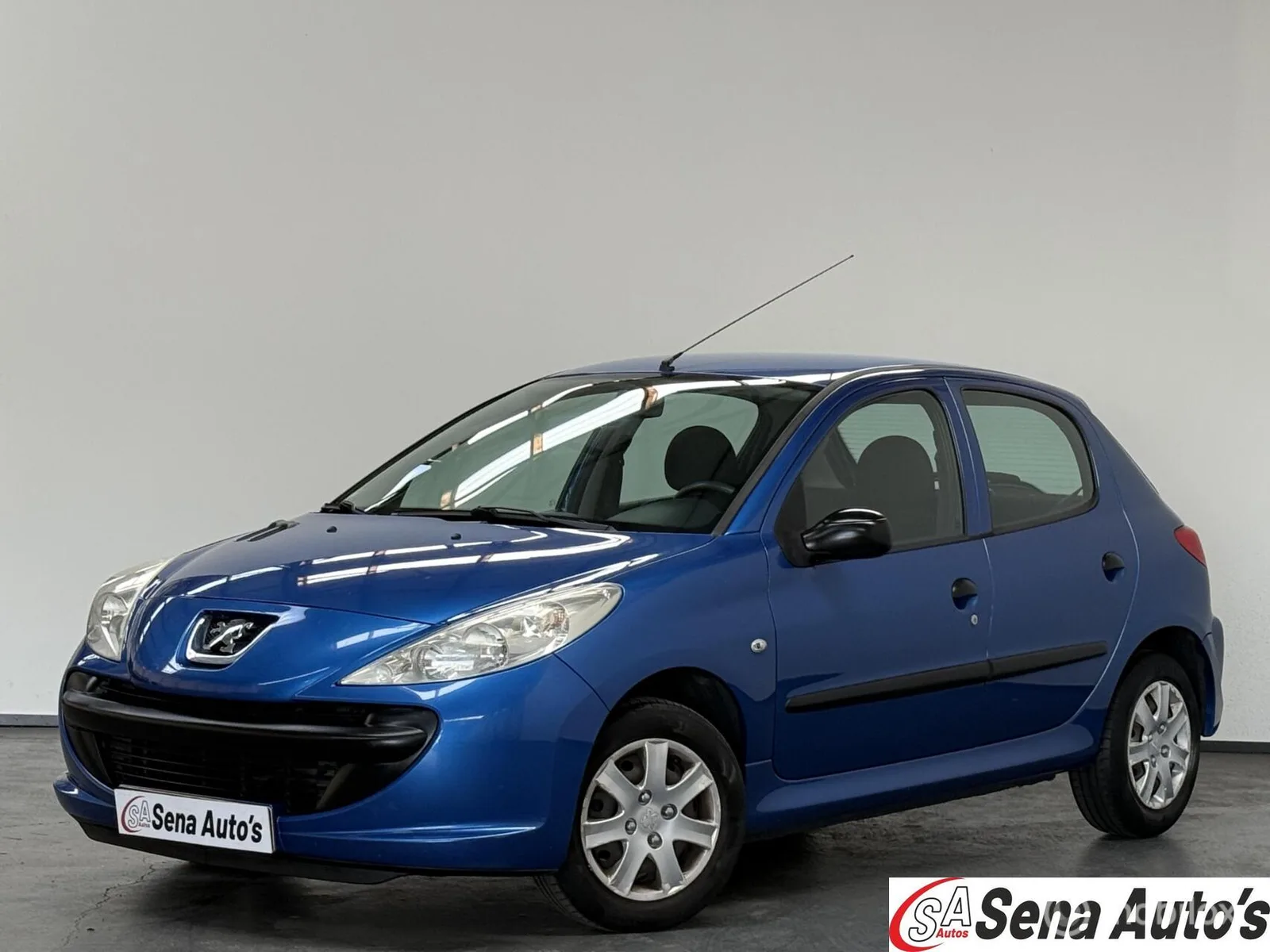 Peugeot 206 (2011) — foto 1