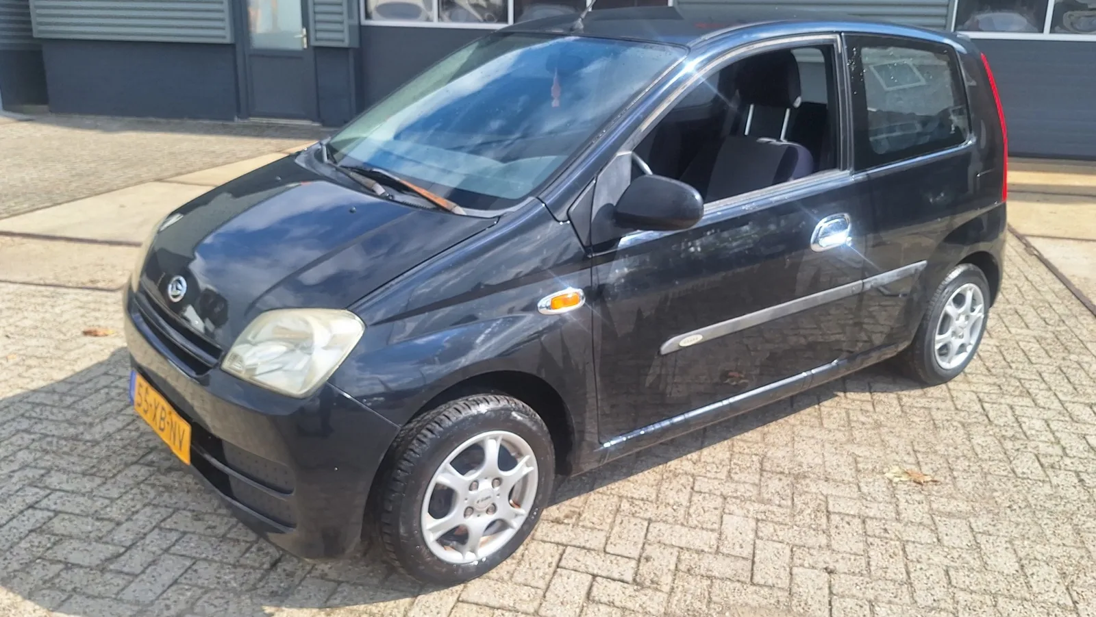 Daihatsu Cuore (2007) — foto 1