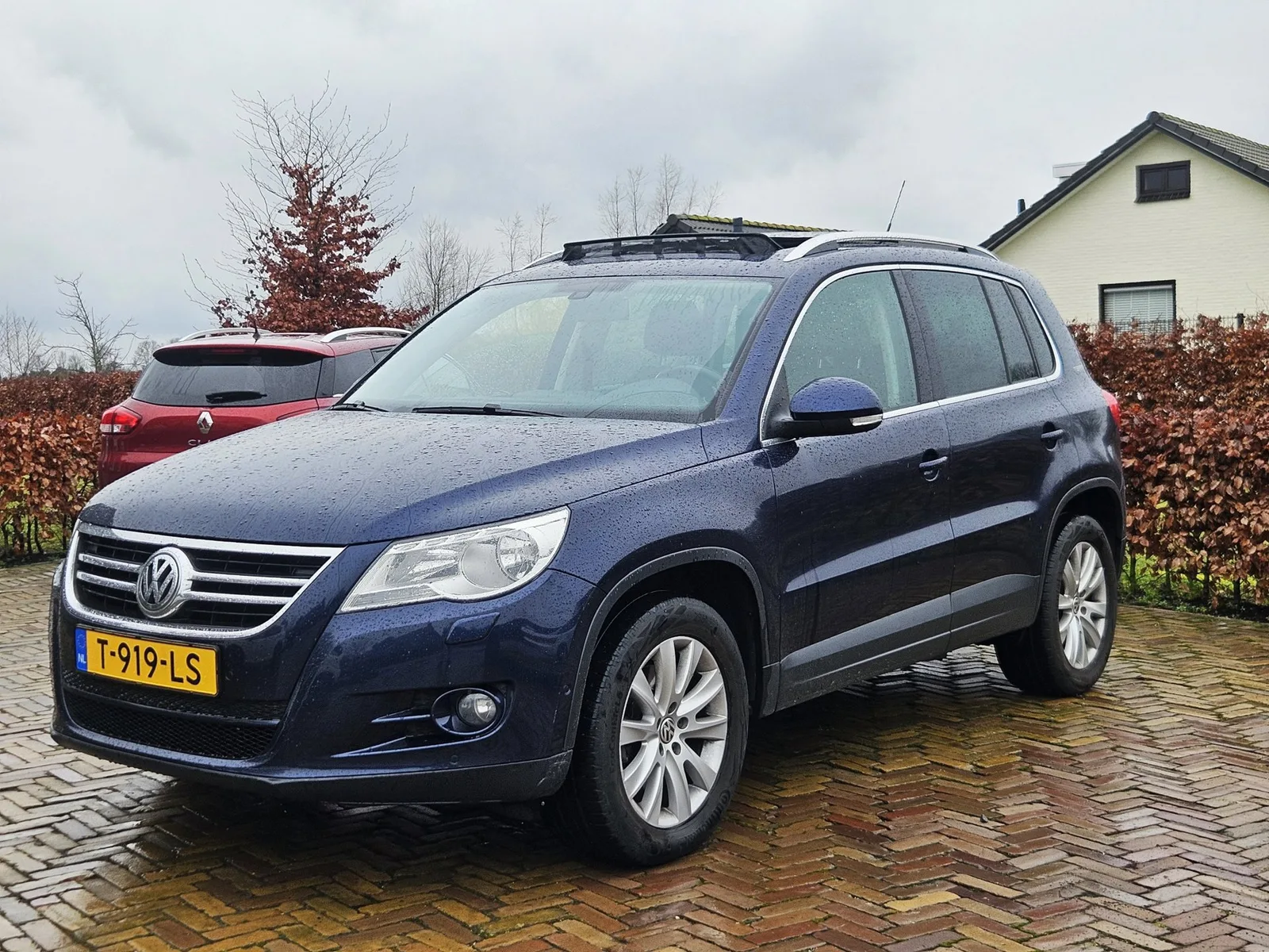 Volkswagen Tiguan (2010) — foto 1