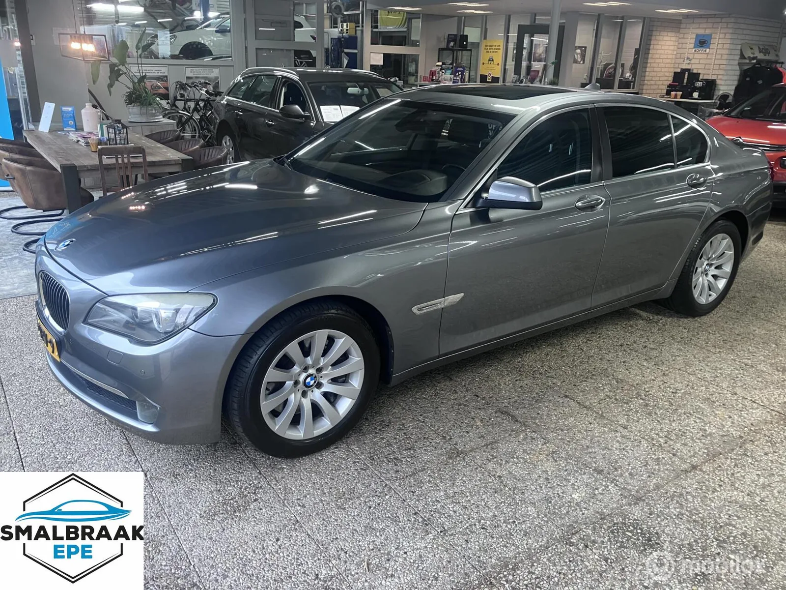BMW 7-Serie (2009) — foto 1