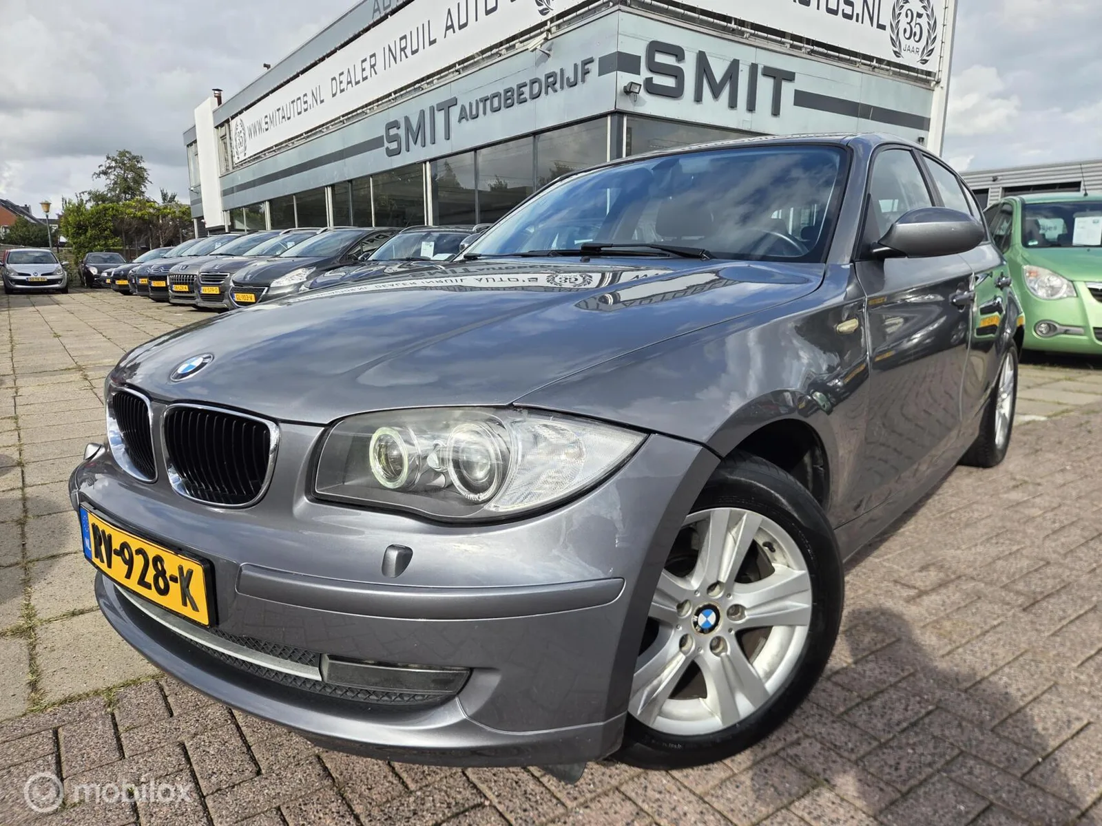 BMW 1-Serie (2009) — foto 1