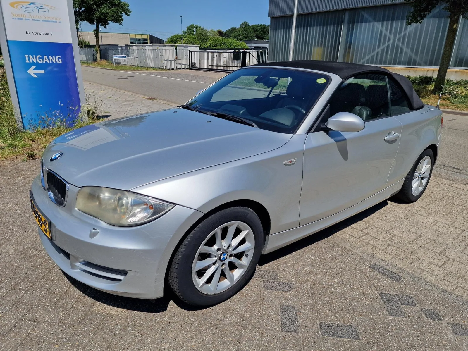 BMW 1-Serie (2009) — foto 1