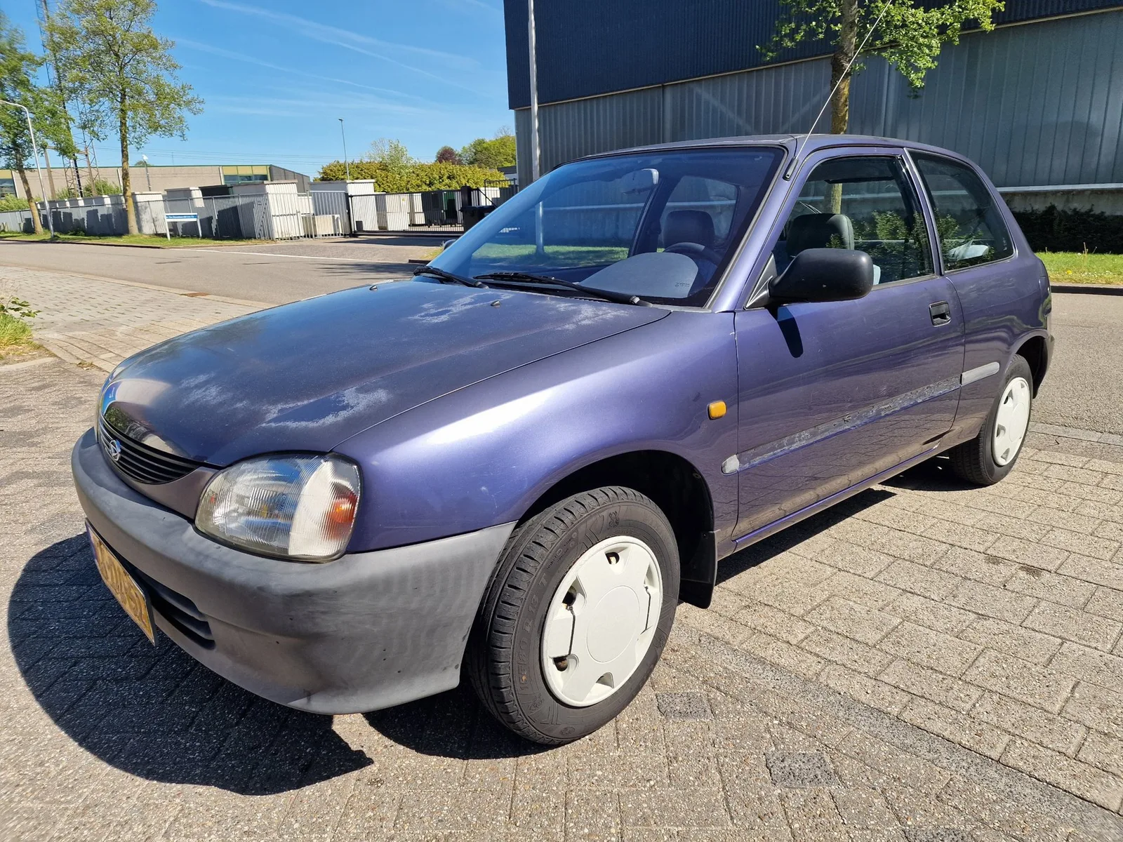 Daihatsu Charade (1998) — foto 1