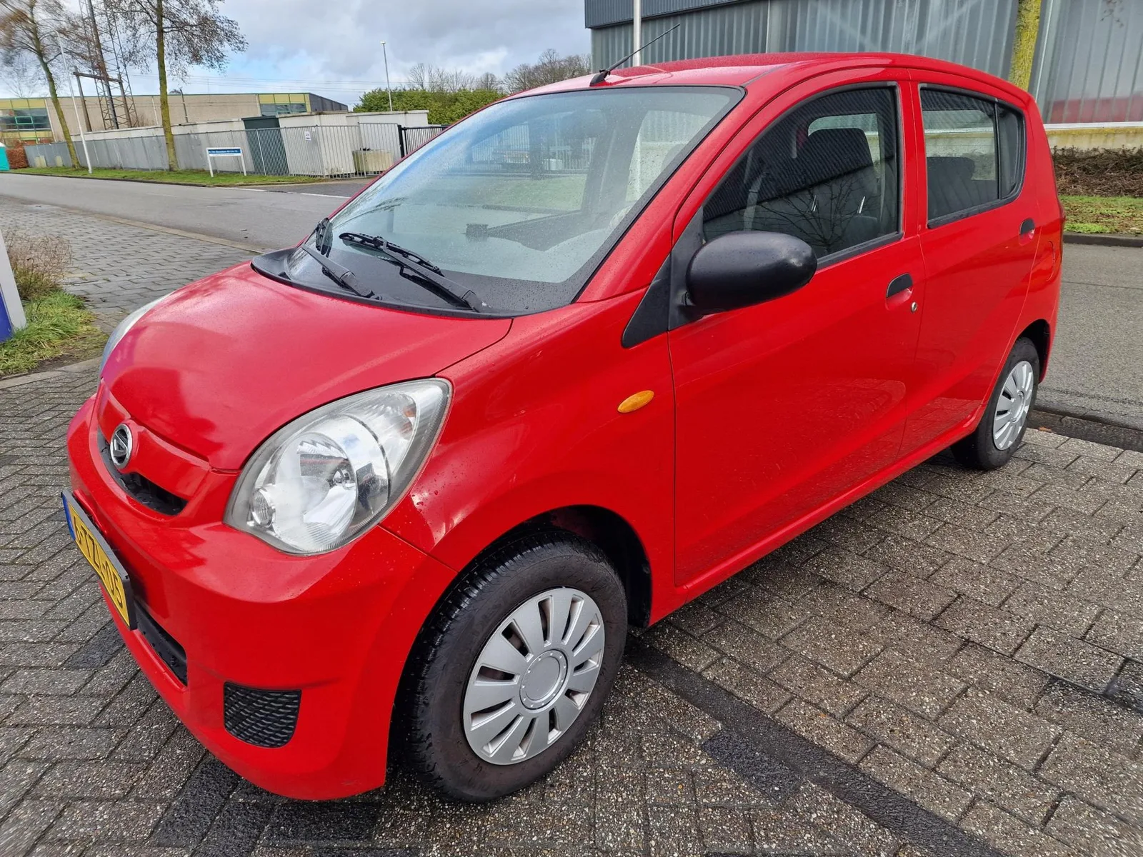 Daihatsu Cuore (2007) — foto 1