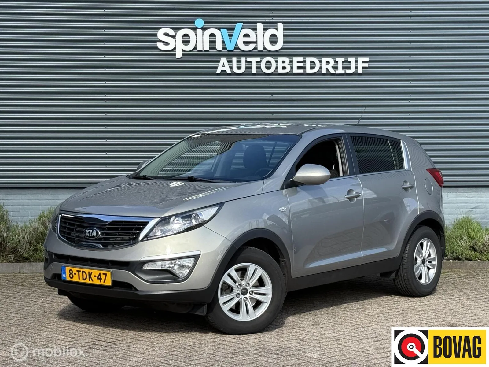 Kia Sportage (2013) — foto 1