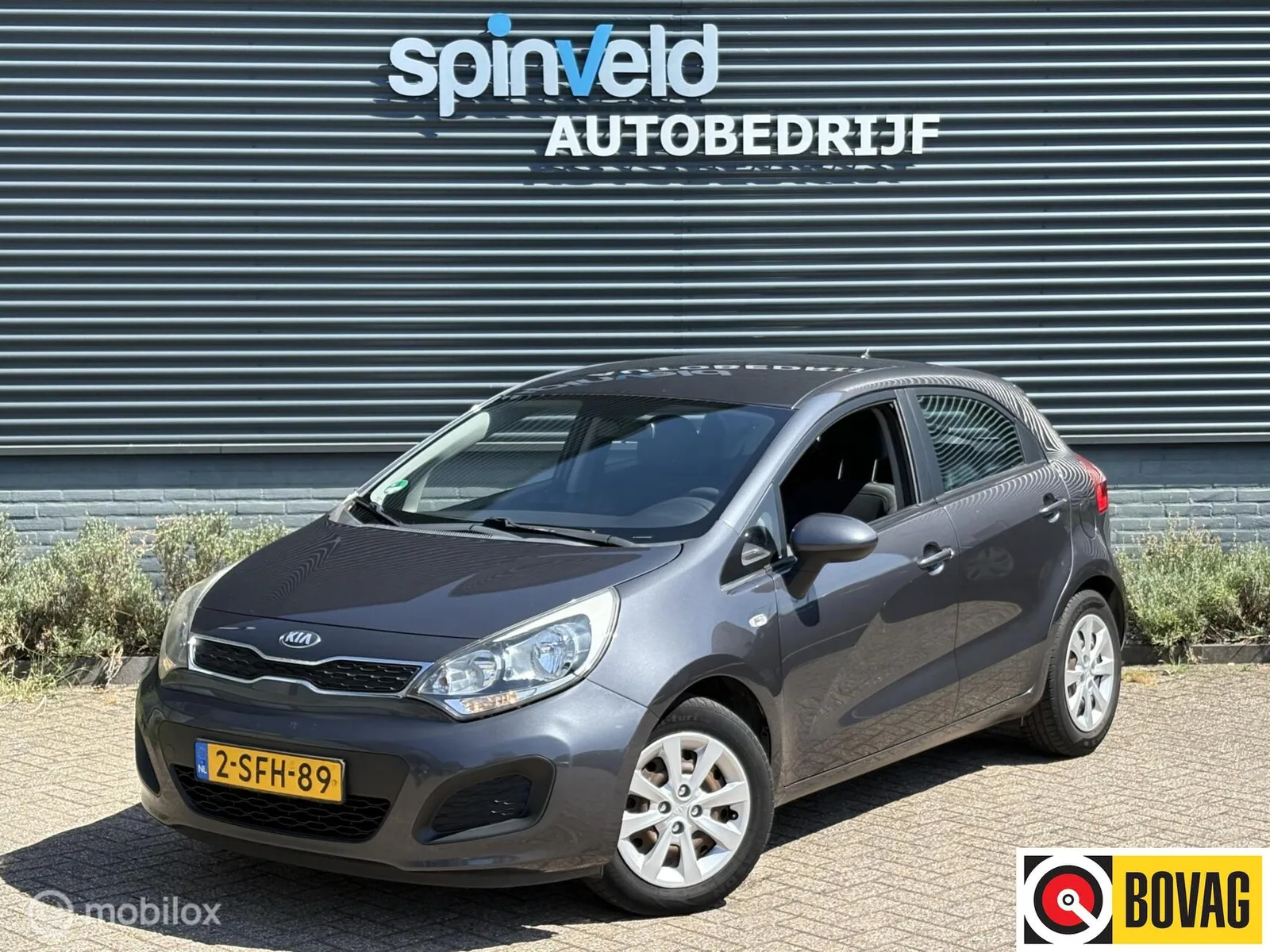 Kia Rio (2013) — foto 1