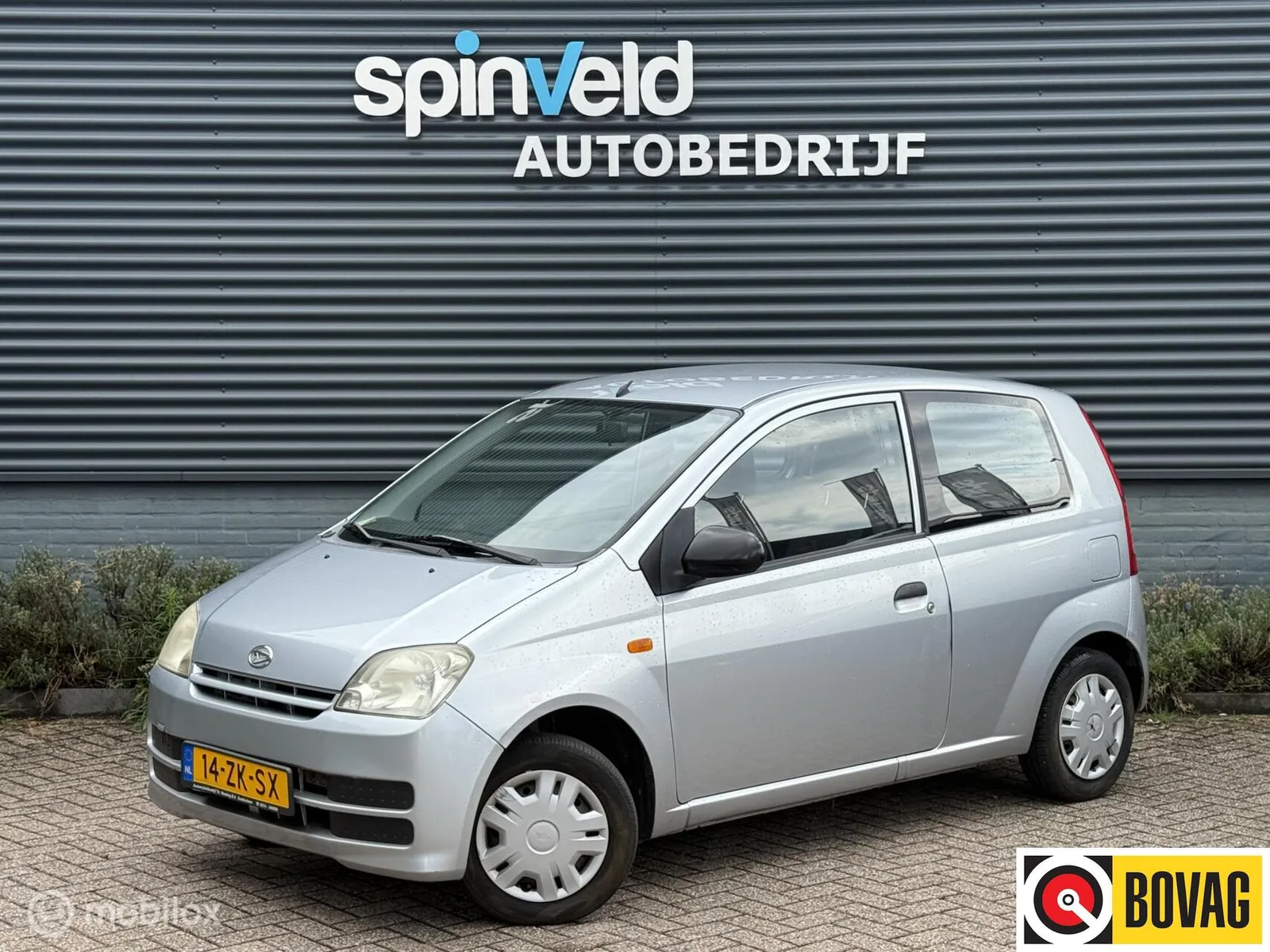 Daihatsu Cuore (2008) — foto 1