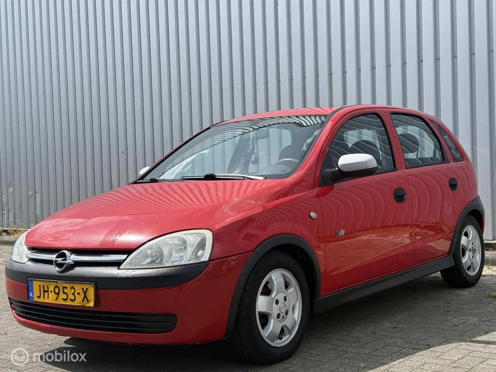Opel Corsa (2003) — foto 1