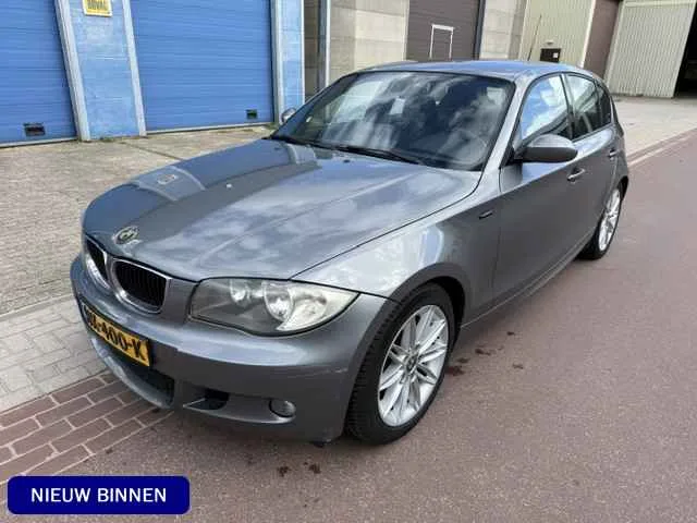 BMW 1-Serie (2009) — foto 1