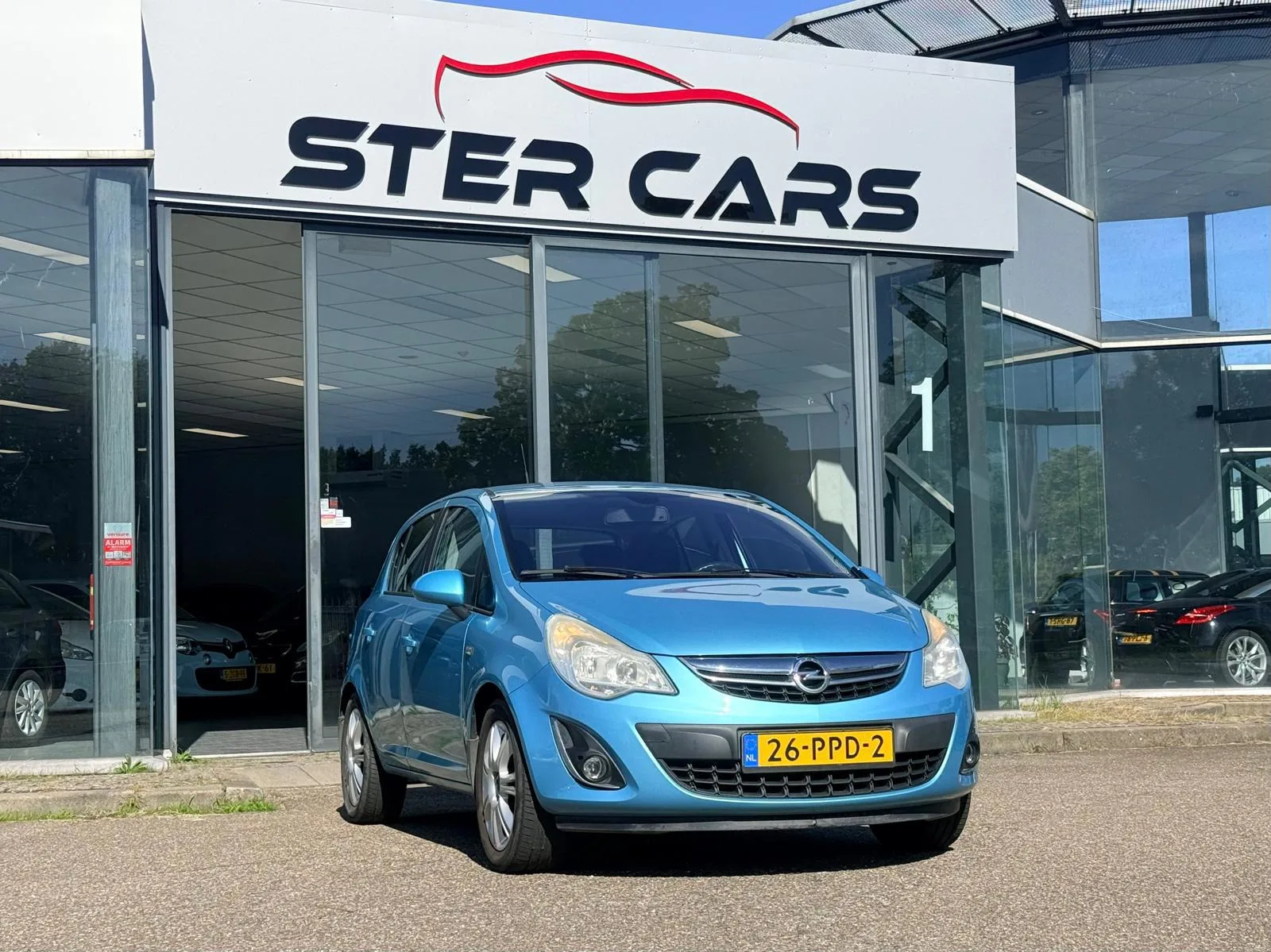 Opel Corsa (2011) — foto 1