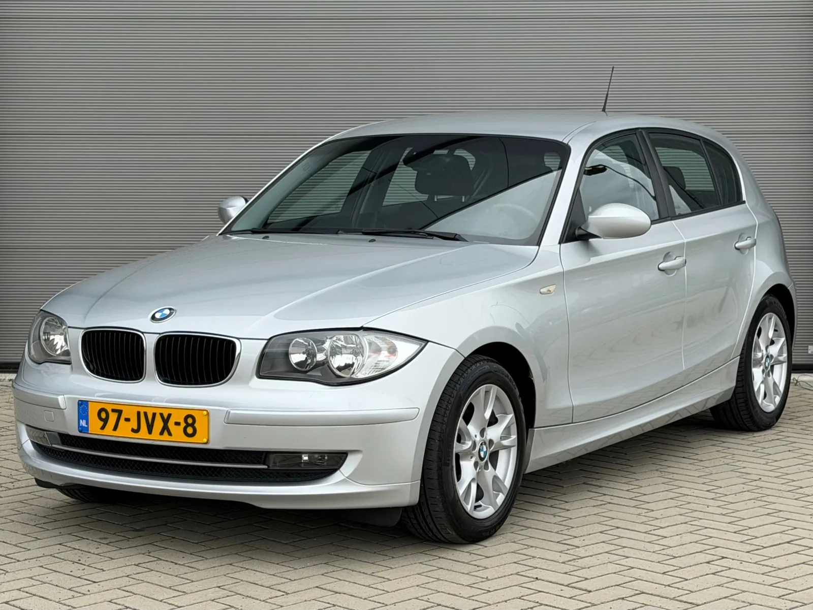 BMW 1-Serie (2009) — foto 1