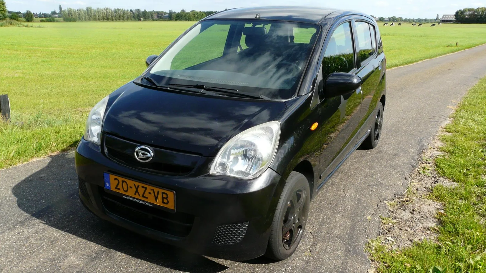 Daihatsu Cuore (2007) — foto 1