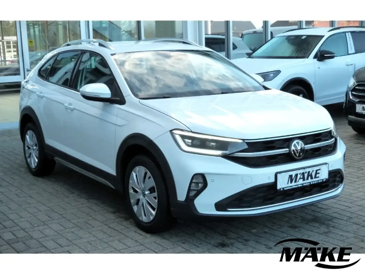 Volkswagen Taigo (2023) — foto 1