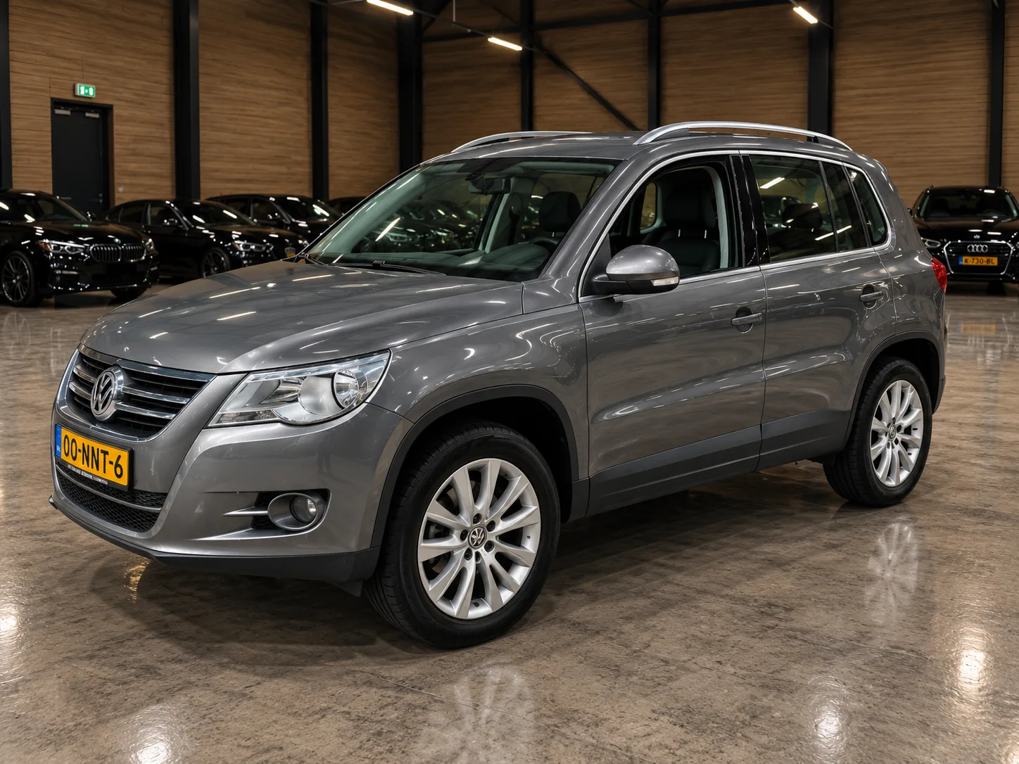 Volkswagen Tiguan (2010) — foto 1