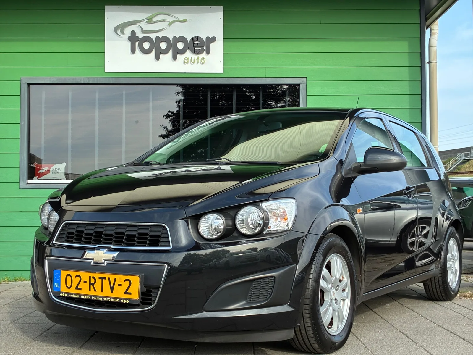 Chevrolet Aveo (2011) — foto 1