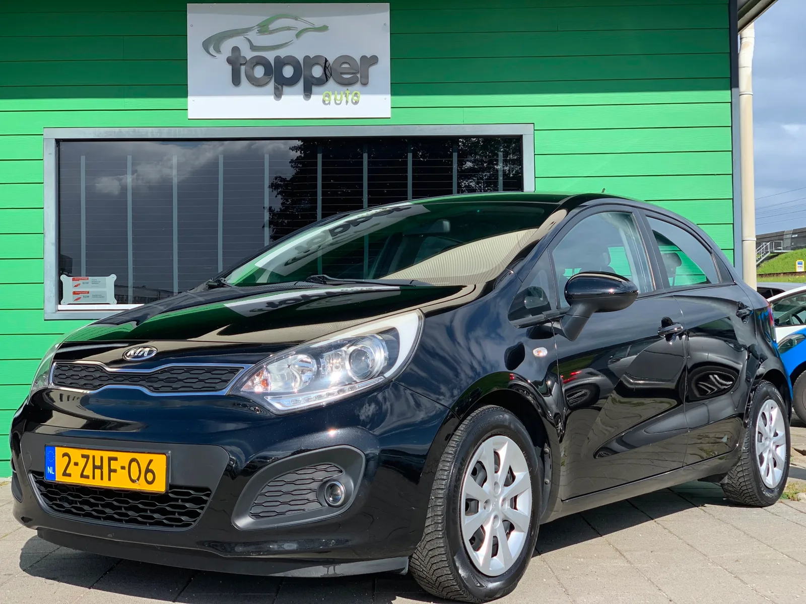 Kia Rio (2015) — foto 1