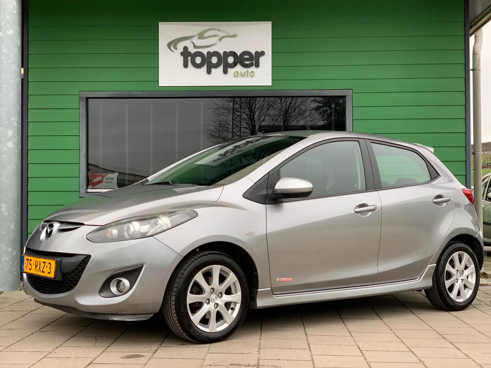 Mazda 2 (2011) — foto 1
