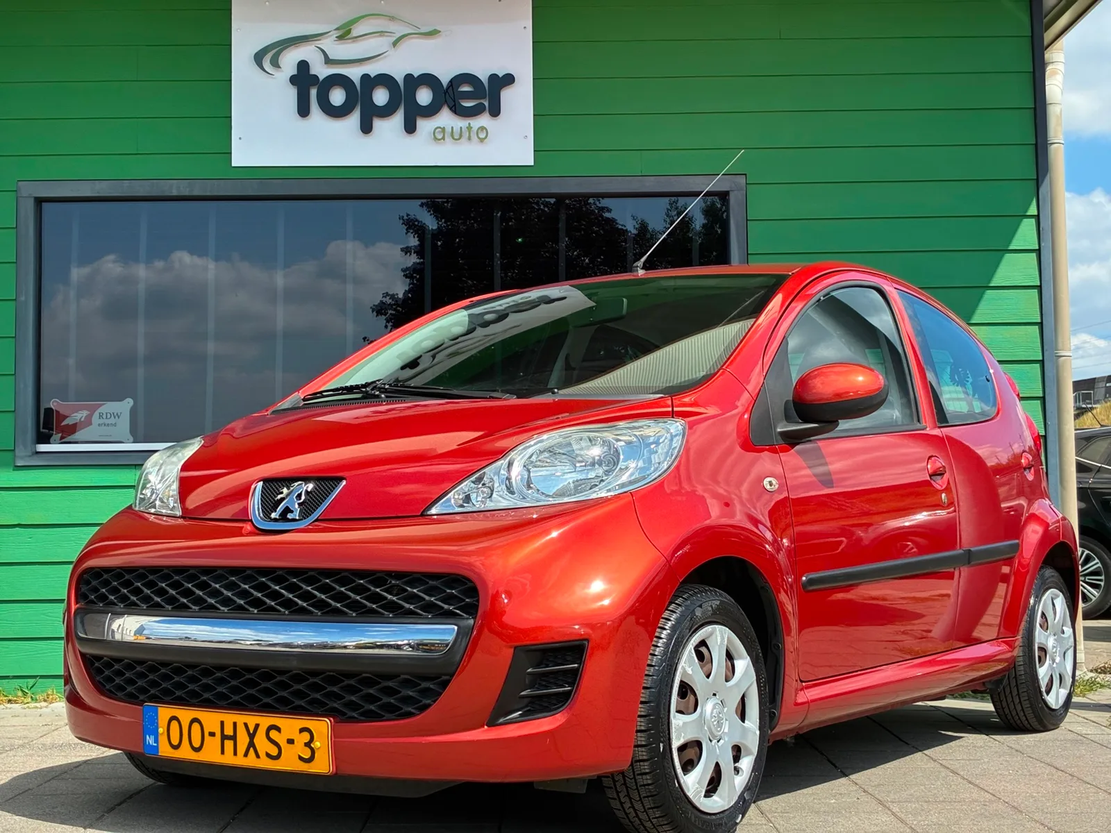 Peugeot 107 (2009) — foto 1