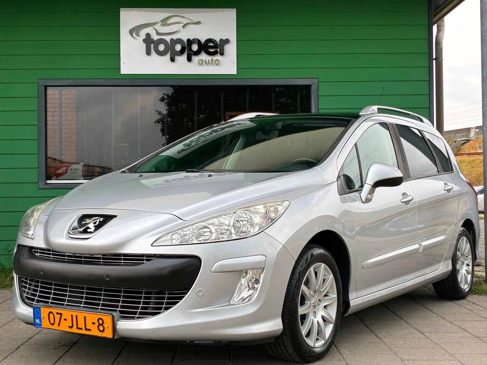 Peugeot 308 (2009) — foto 1