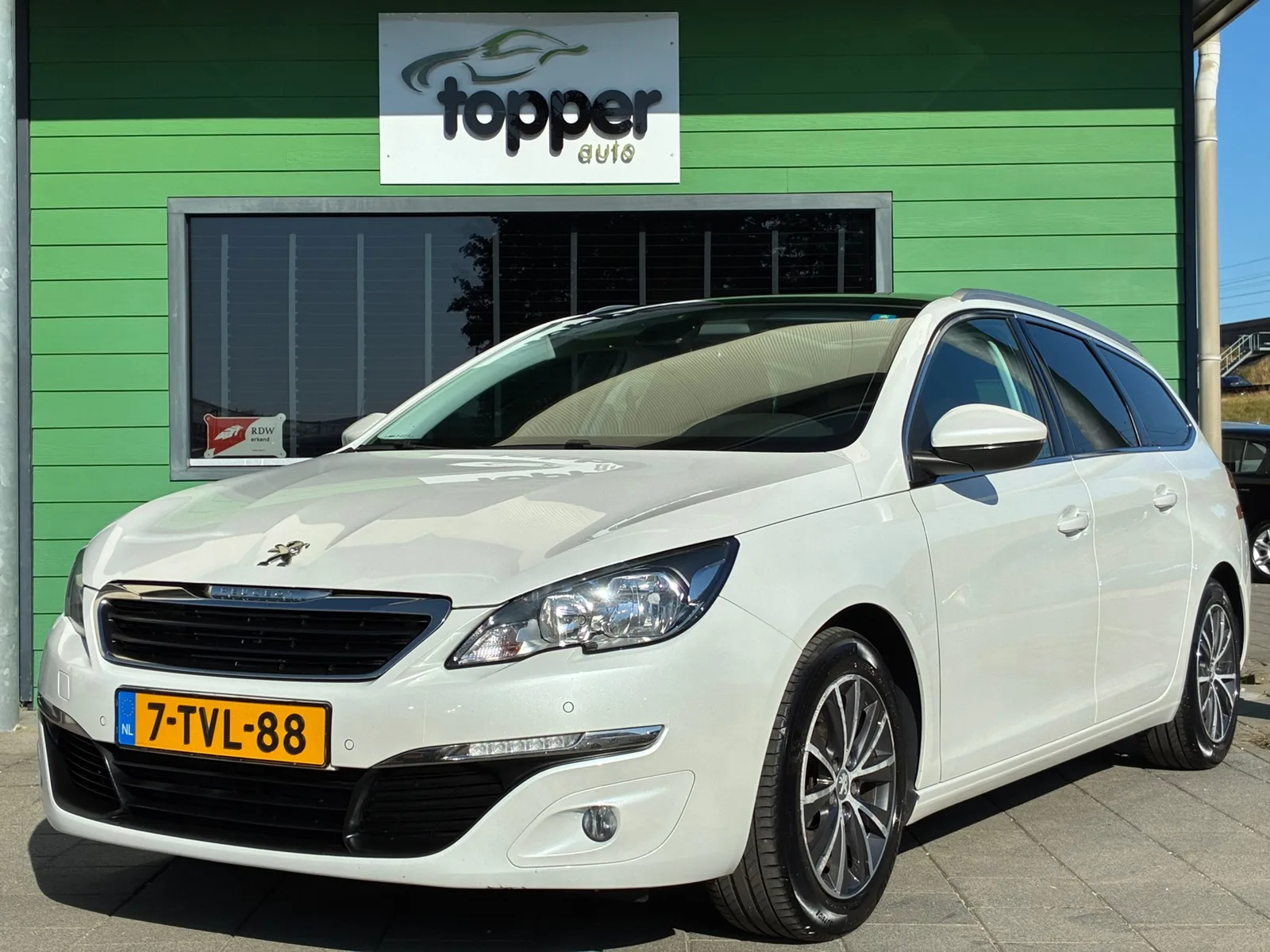 Peugeot 308 (2014) — foto 1
