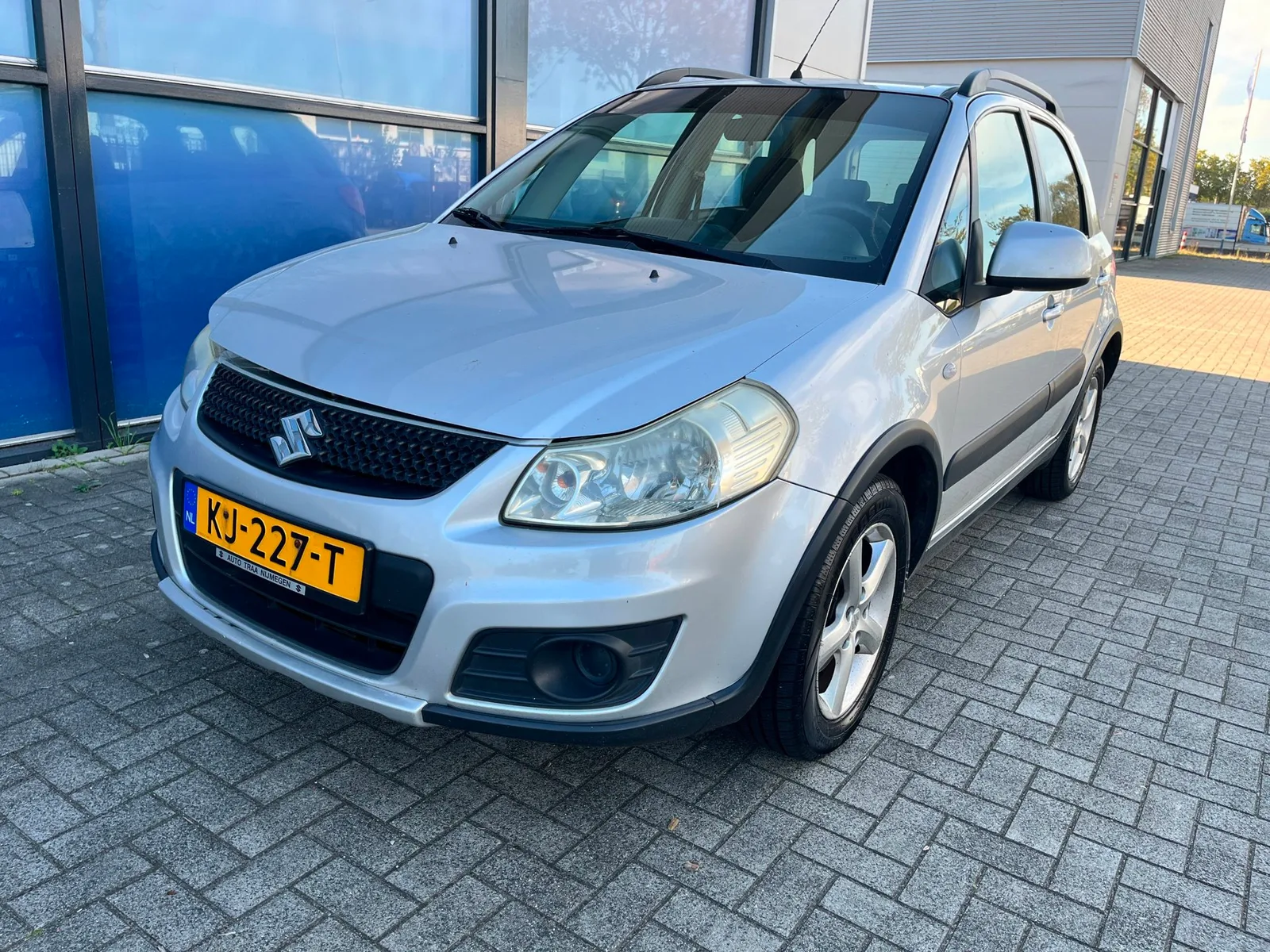 Suzuki SX4 (2012) — foto 1