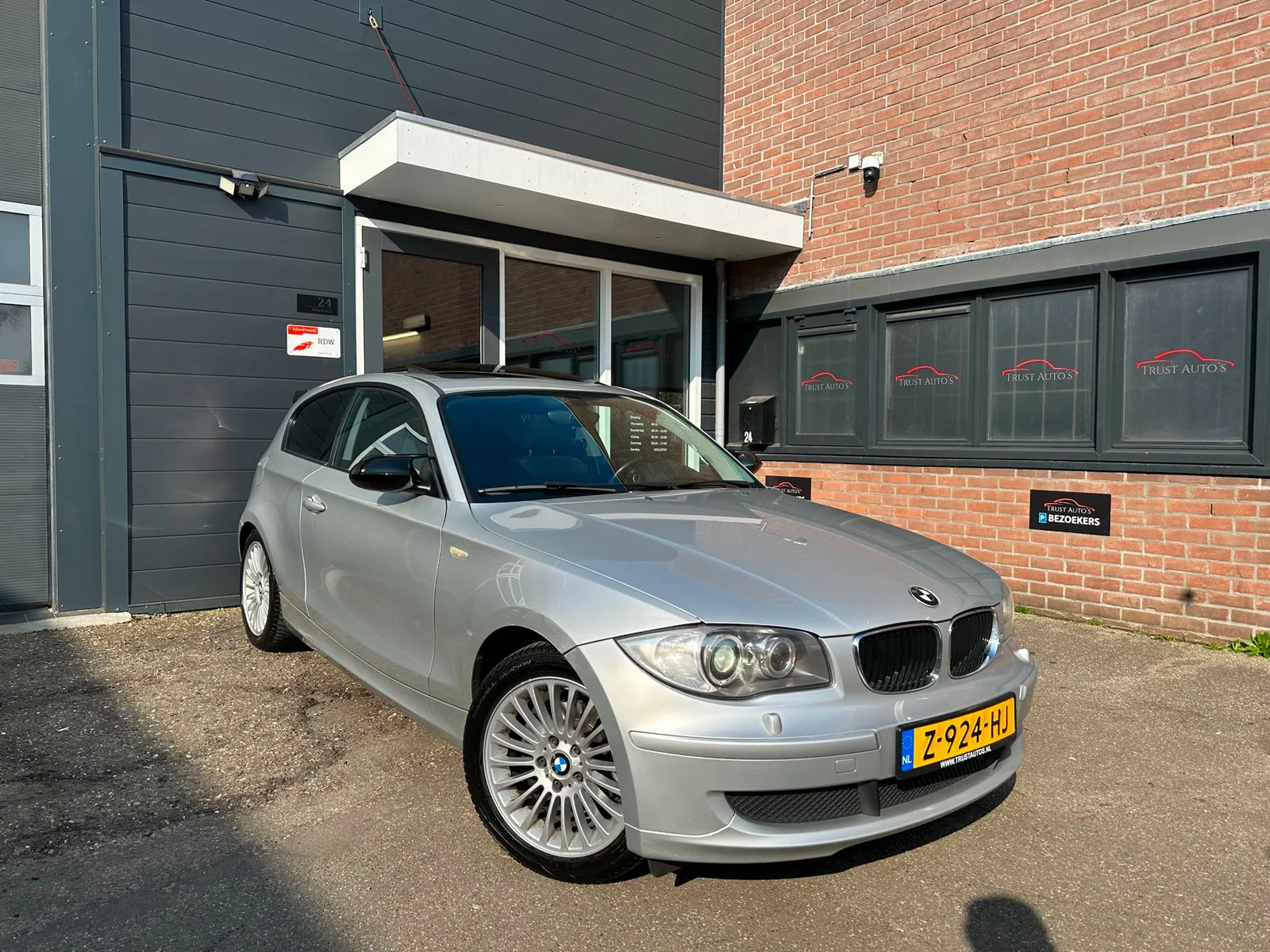 BMW 1-Serie (2009) — foto 1