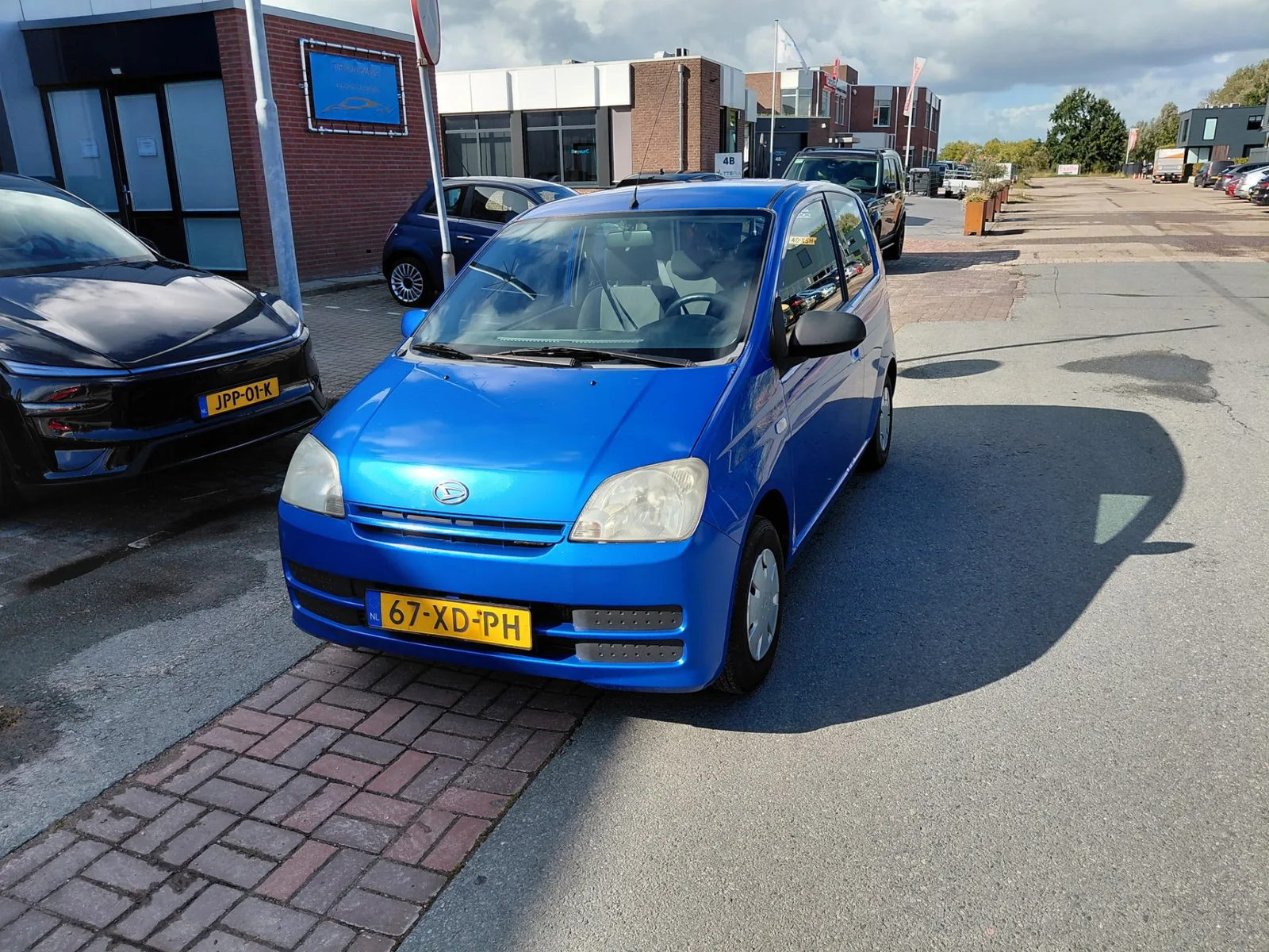 Daihatsu Cuore (2007) — foto 1