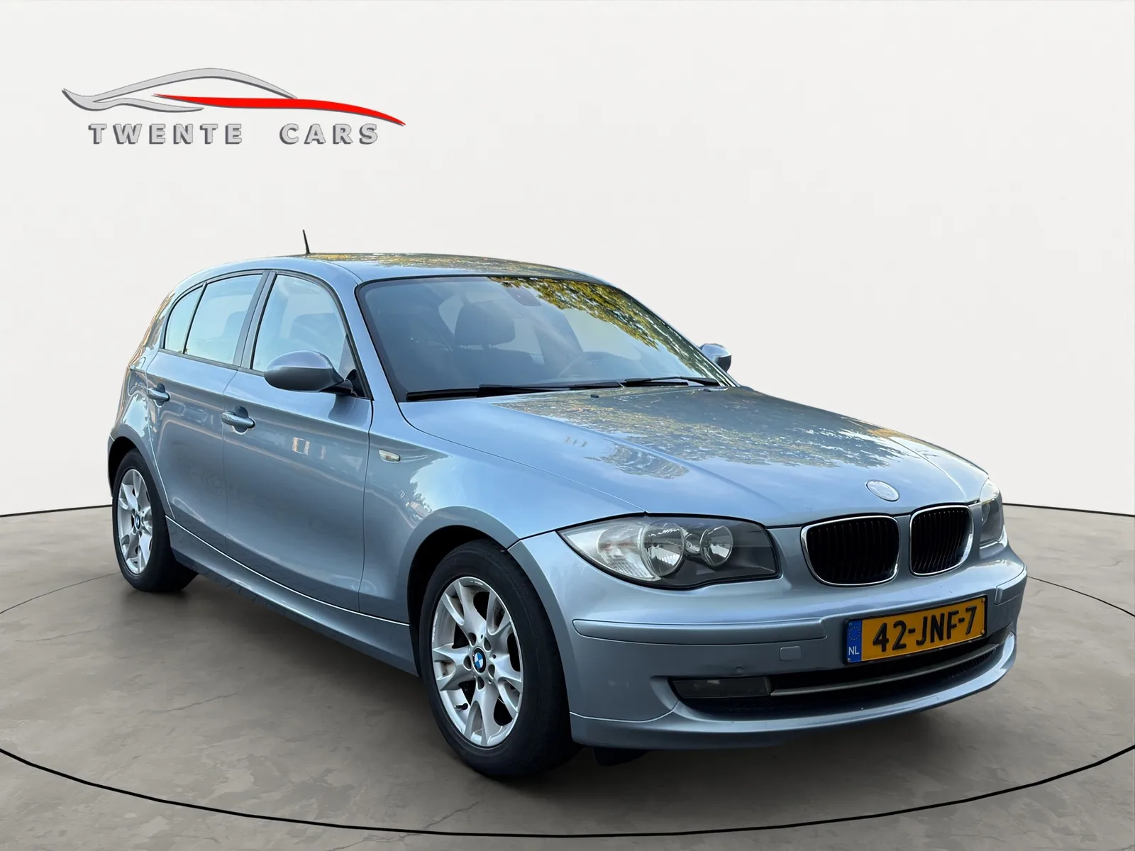 BMW 1-Serie (2009) — foto 1