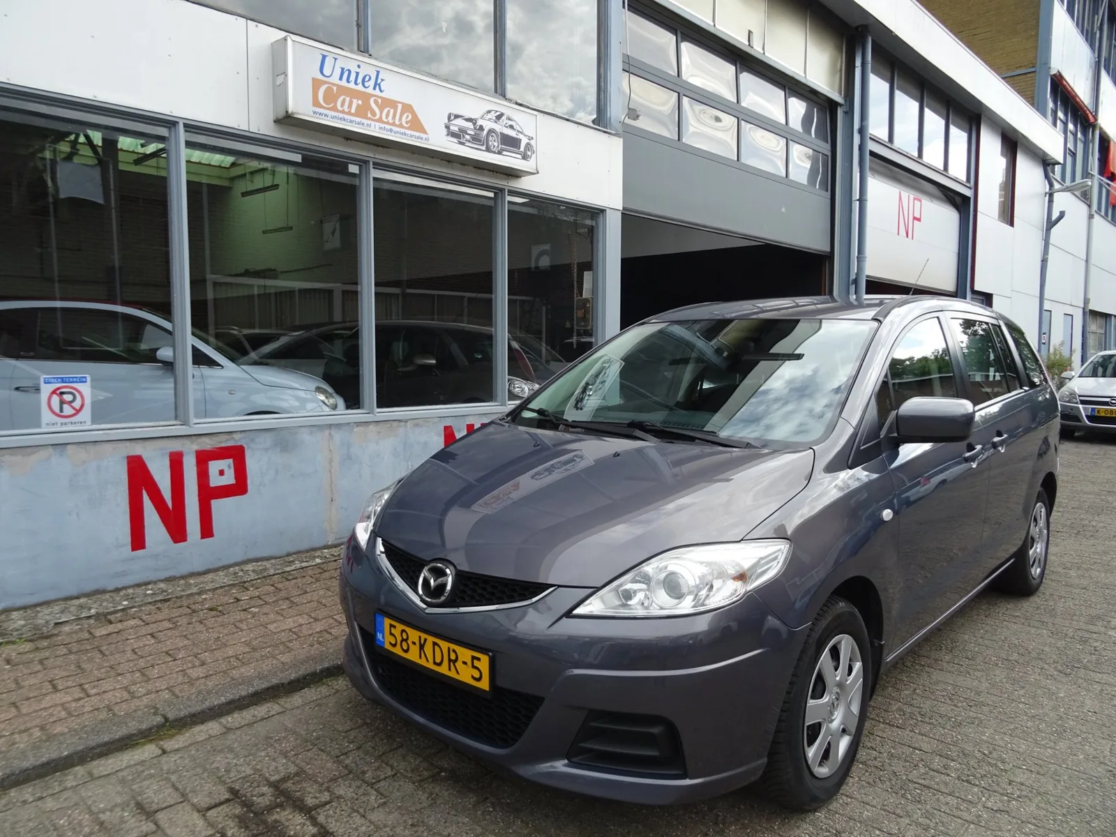 Mazda 5 (2009) — foto 1