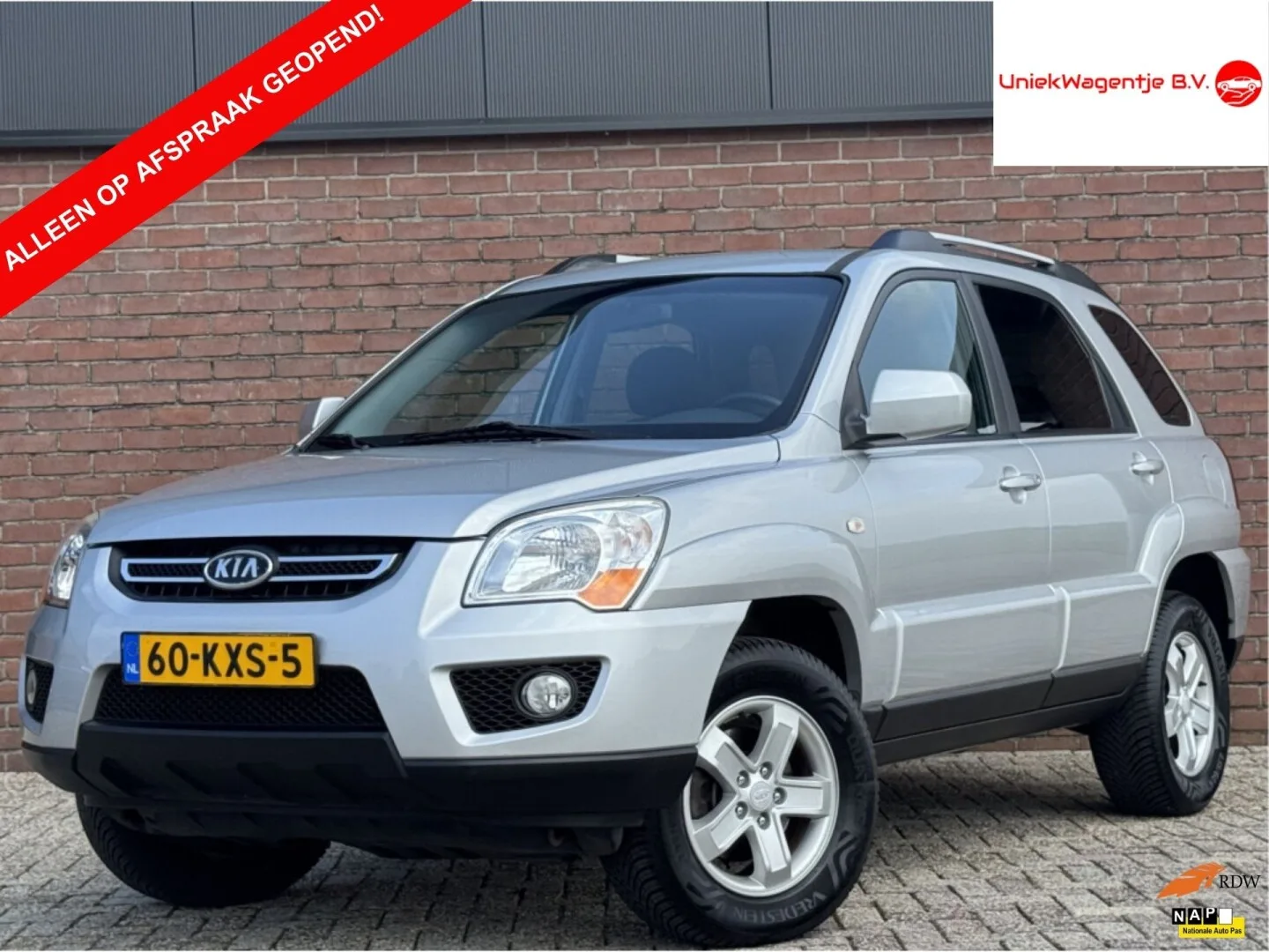 Kia Sportage (2010) — foto 1