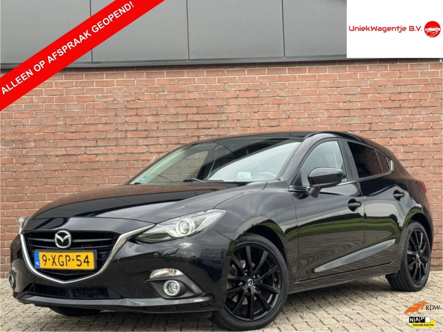 Mazda 3 (2014) — foto 1