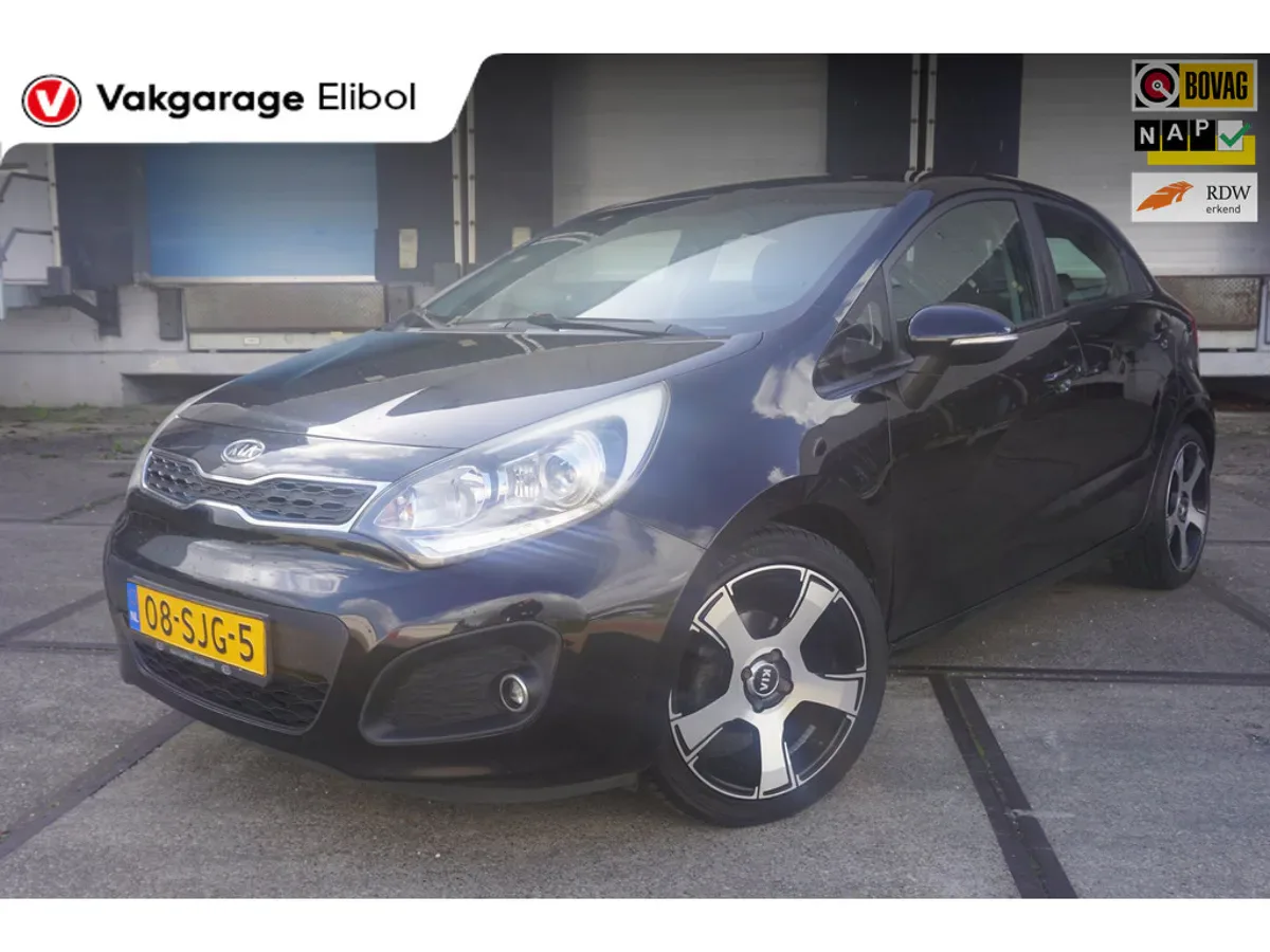 Kia Rio (2011) — foto 1