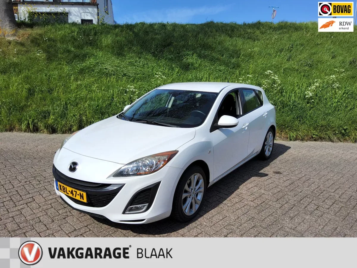 Mazda 3 (2011) — foto 1