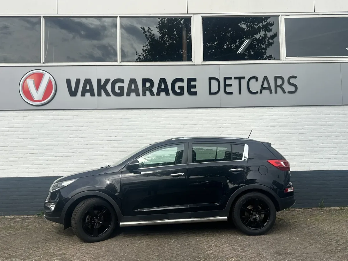 Kia Sportage (2013) — foto 1