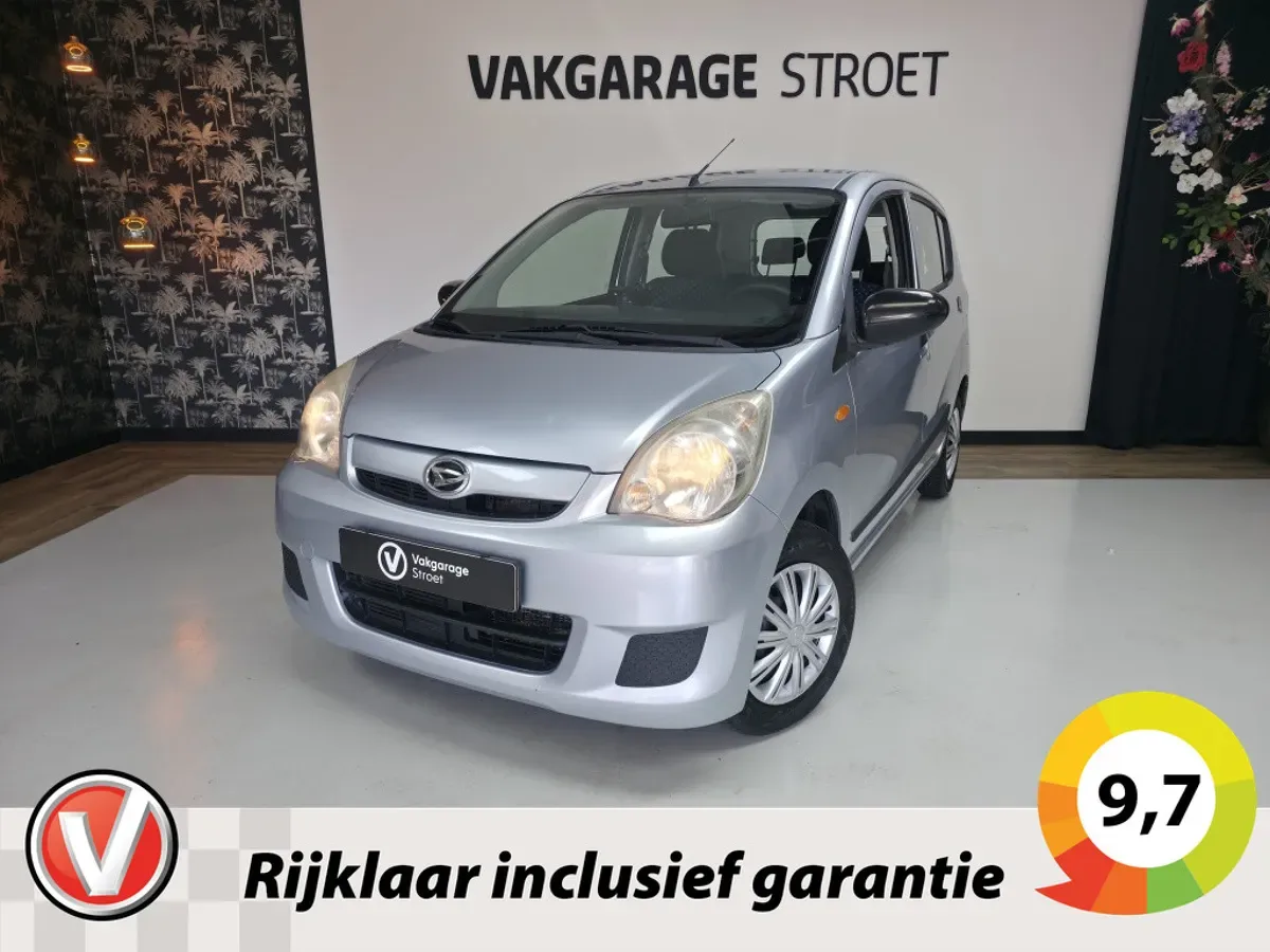 Daihatsu Cuore (2010) — foto 1