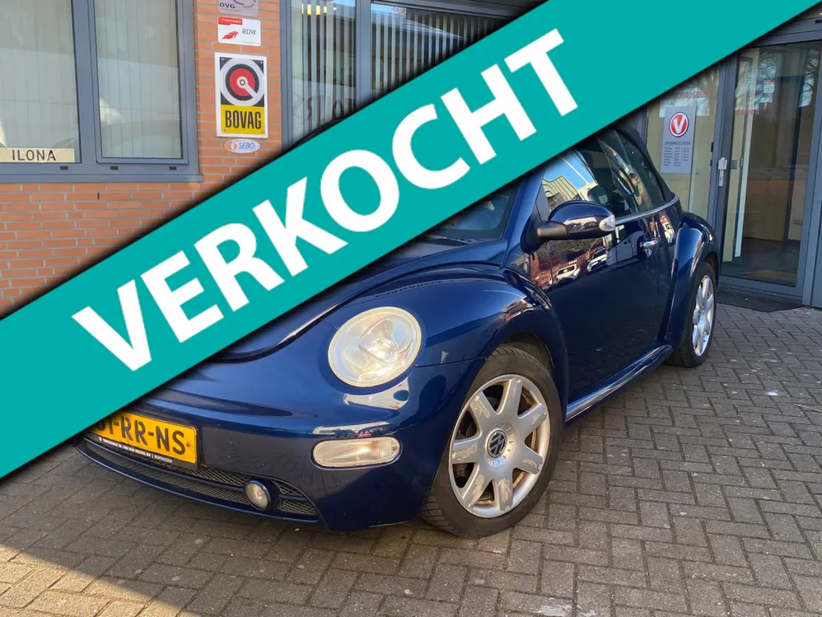 Volkswagen New Beetle (2004) — foto 1